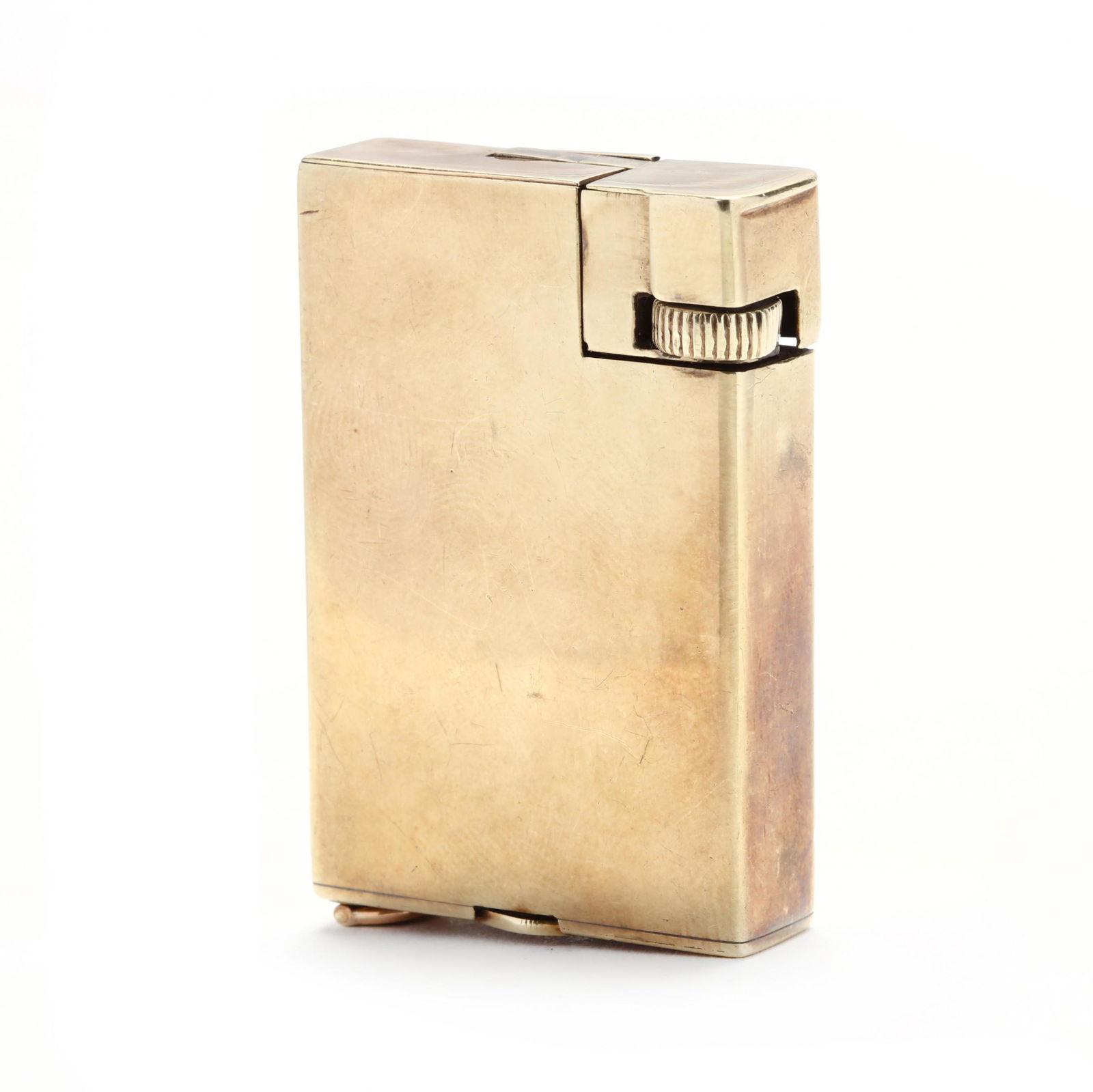 Vintage 14KT Gold Lighter, Dunhill: Vintage 14KT Gold Lighter, Dunhillof rectangular form, case with single screw signed Dunhill and stamped 14K. 2 x 1.25 in. Additional high-resolution photos are available at LelandLittle.com