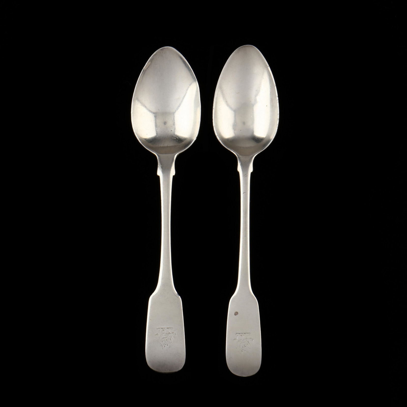 Two Irish George III Silver Teaspoons: Two Irish George III Silver Teaspoons both with mark of Richard Garde, the first with Dublin (1823) and the second with Dublin (1829) hallmarks, both engraved "I. & E. W." to the underside of handle a