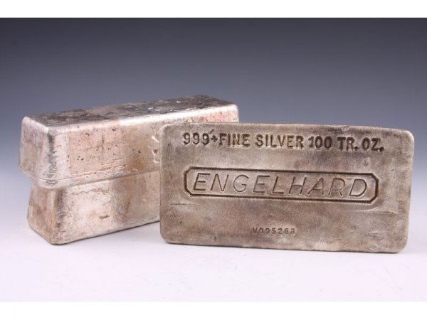 Three .999 Fine Silver Bars,: Three .999 Fine Silver Bars, two bars marked "JM," each reading "100 TR. OZ," one measures 6 3/8," the other measuring 6.25," both weighing approximately 7lbs; the other reads "Engelhard 100TR. OZ," m