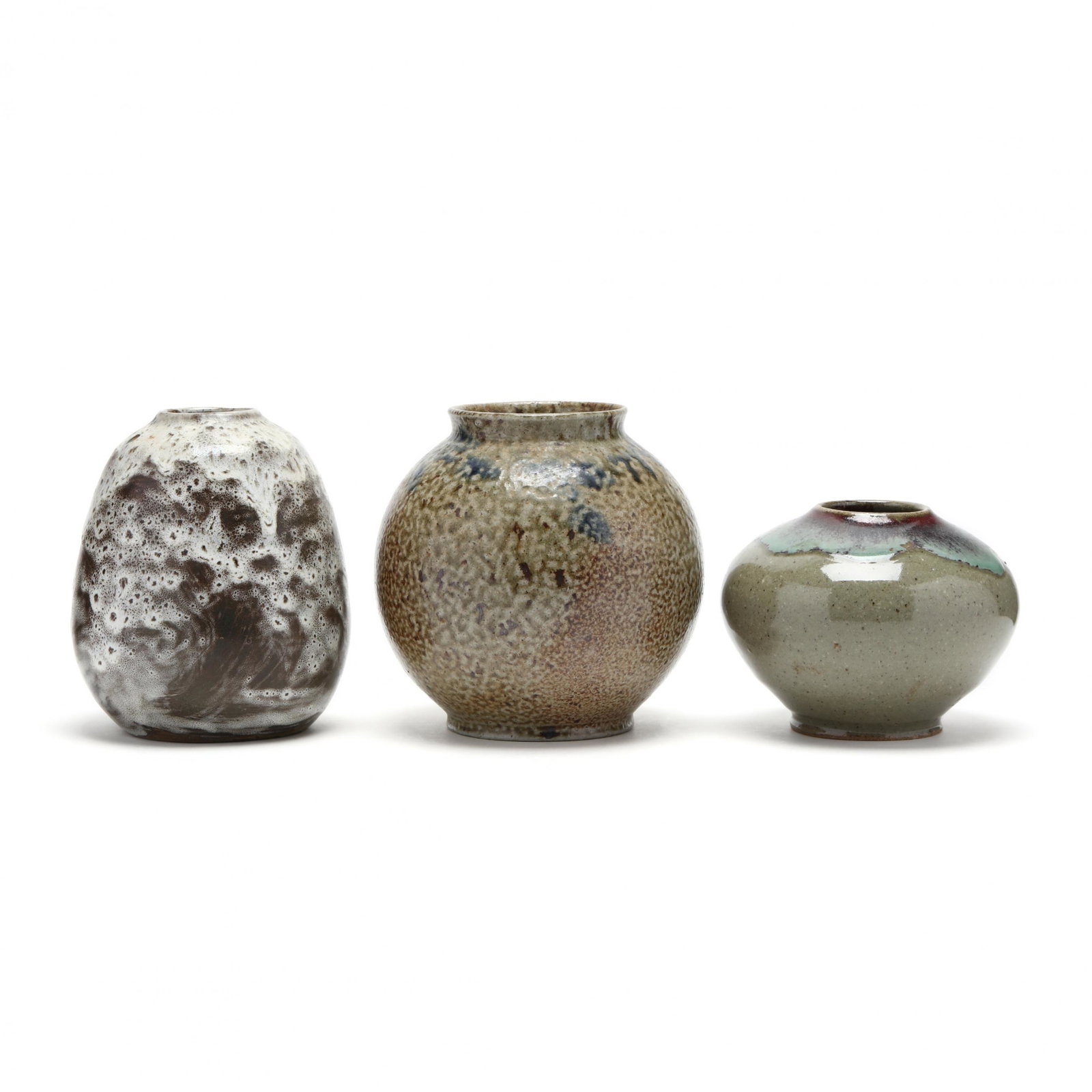Three NC Pottery Vases, Jugtown: Three NC Pottery Vases, Jugtown attributed to Vernon Owens, a hard-to-find "Black Ankle" pear vase (6 in.); an ovoid salt-glazed vase with cobalt drips (6 in.); a low footed vase with "Chinese Blue" g