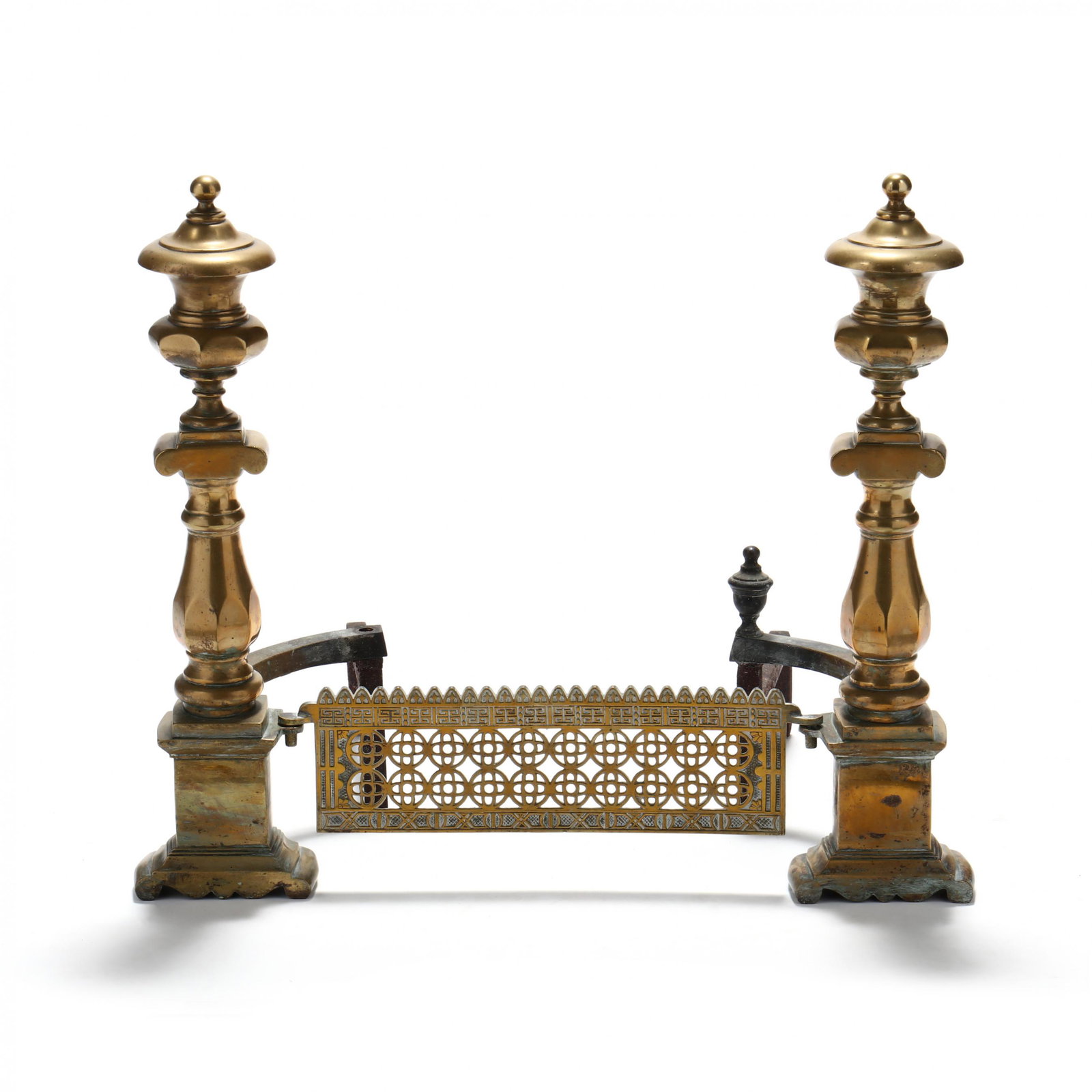 Pair of Southern Federal Brass and Cast Andirons: Pair of Southern Federal Brass and Cast Andirons attributed to Charleston, South Carolina, circa 1800-1810, tall classical form featuring upper urn with ball finial, above an Ionic capital above an oc