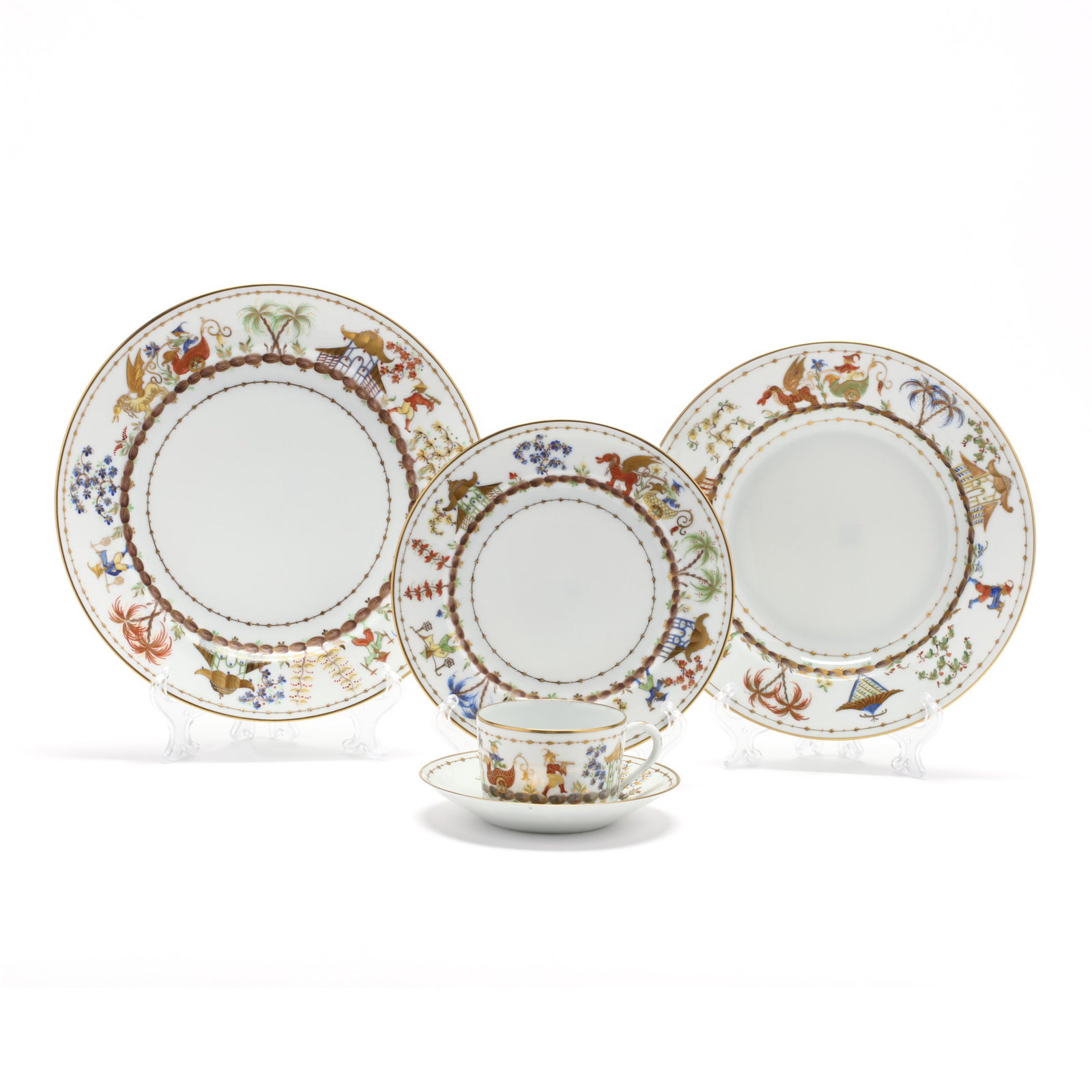 (36) Pieces of Tiffany & Co., Private Stock Cirque: (36) Pieces of Tiffany & Co., Private Stock Cirque Chinois Dinner Service France, 20th century, hand painted and with gilt highlights including (eight) dinner plates (10.25 in.); (six) soup bowls (9.2