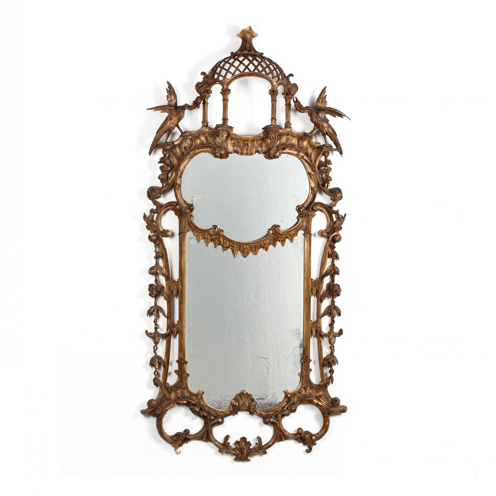 Antique Continental Carved and Gilt Mirror: Antique Continental Carved and Gilt Mirror 19th century, carved wood and gesso, well-developed form, with reticulated corona, fully developed spread winged ho-ho birds flank the cupola, double paned s