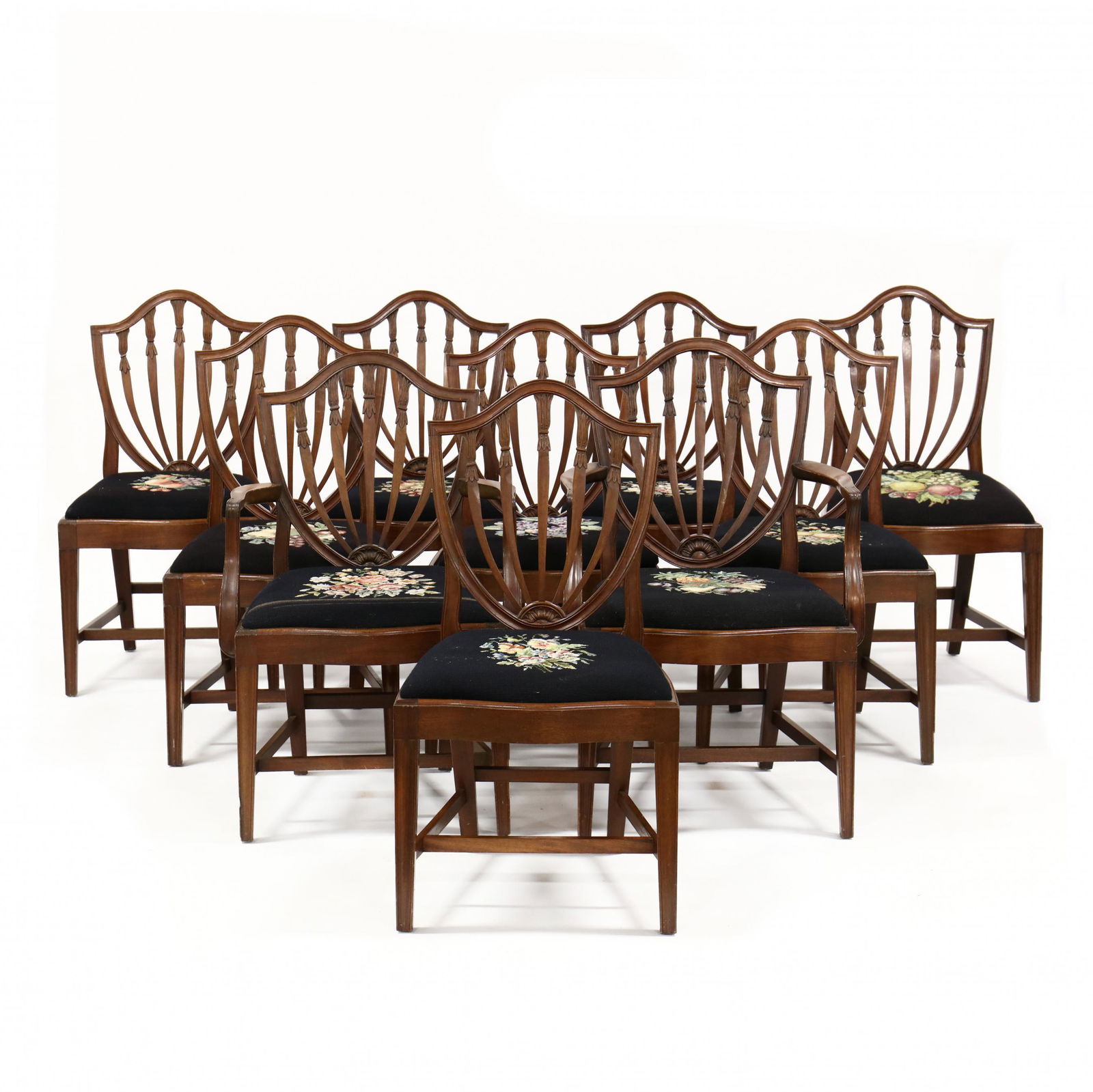 Potthast Bros., Set of Ten Hepplewhite Style Mahogany: Potthast Bros., Set of Ten Hepplewhite Style Mahogany Dining Chairsmid 20th century, to include two armchairs and eight side chairs, solid carved mahogany with relief carved shield backs, serpentine n