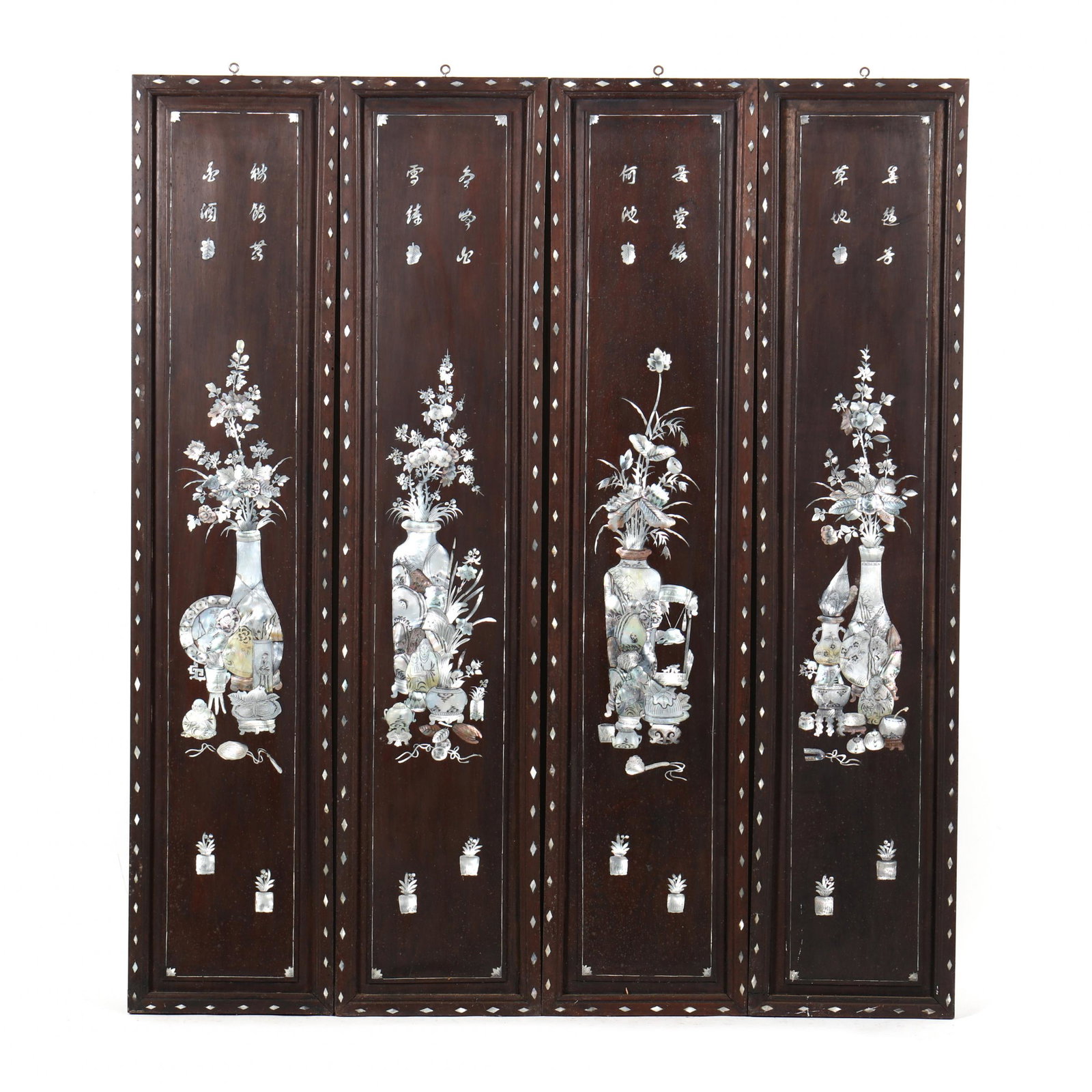A Set of Four Chinese Mother of Pearl Inlaid Wooden: A Set of Four Chinese Mother of Pearl Inlaid Wooden Panels 20th century, Chinese five character calligraphy with a leaf at the end to each on upper portion, below are elegant vases and flowers with ar