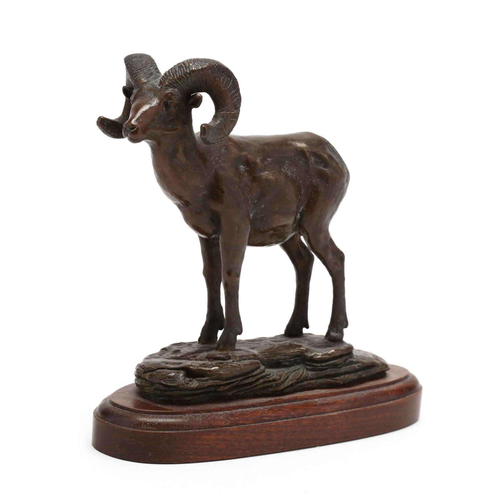 Bruce Brady (MS, 1934-2000), Ram: Bruce Brady (MS, 1934-2000), Ram bronze, signed, dated 85, and numbered 18/50, on wood base. 6 1/8 x 6 x 2 in. From a Private Collection, Charlotte, North Carolina Additional high-resolution photos ar