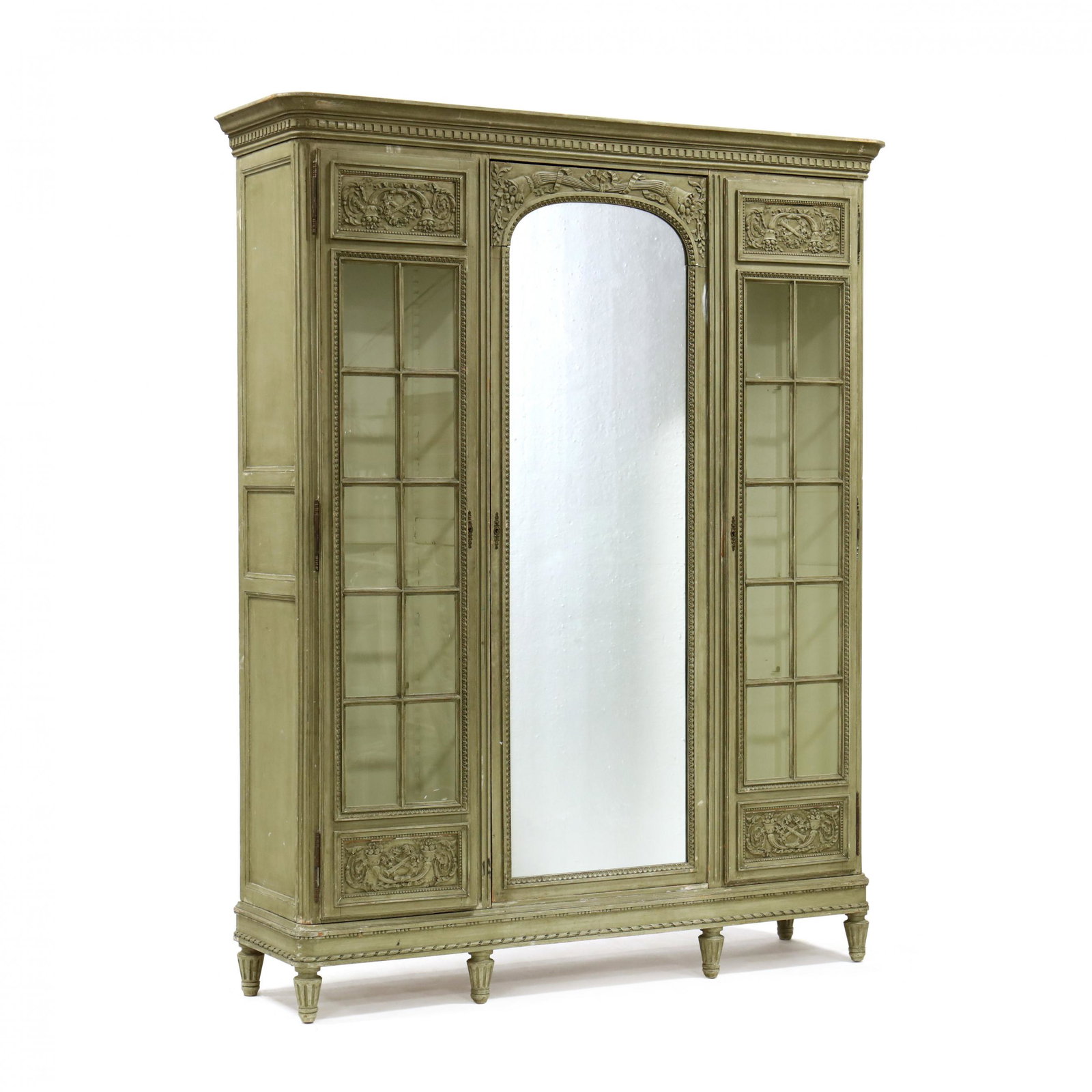 Louis XV Style Carved and Painted Armoire: Louis XV Style Carved and Painted Armoire circa 1900, five-part form, distressed light green painted surface, ogee molded cornice with dentil fretwork, central hinged mirrored cabinet door, flanked by