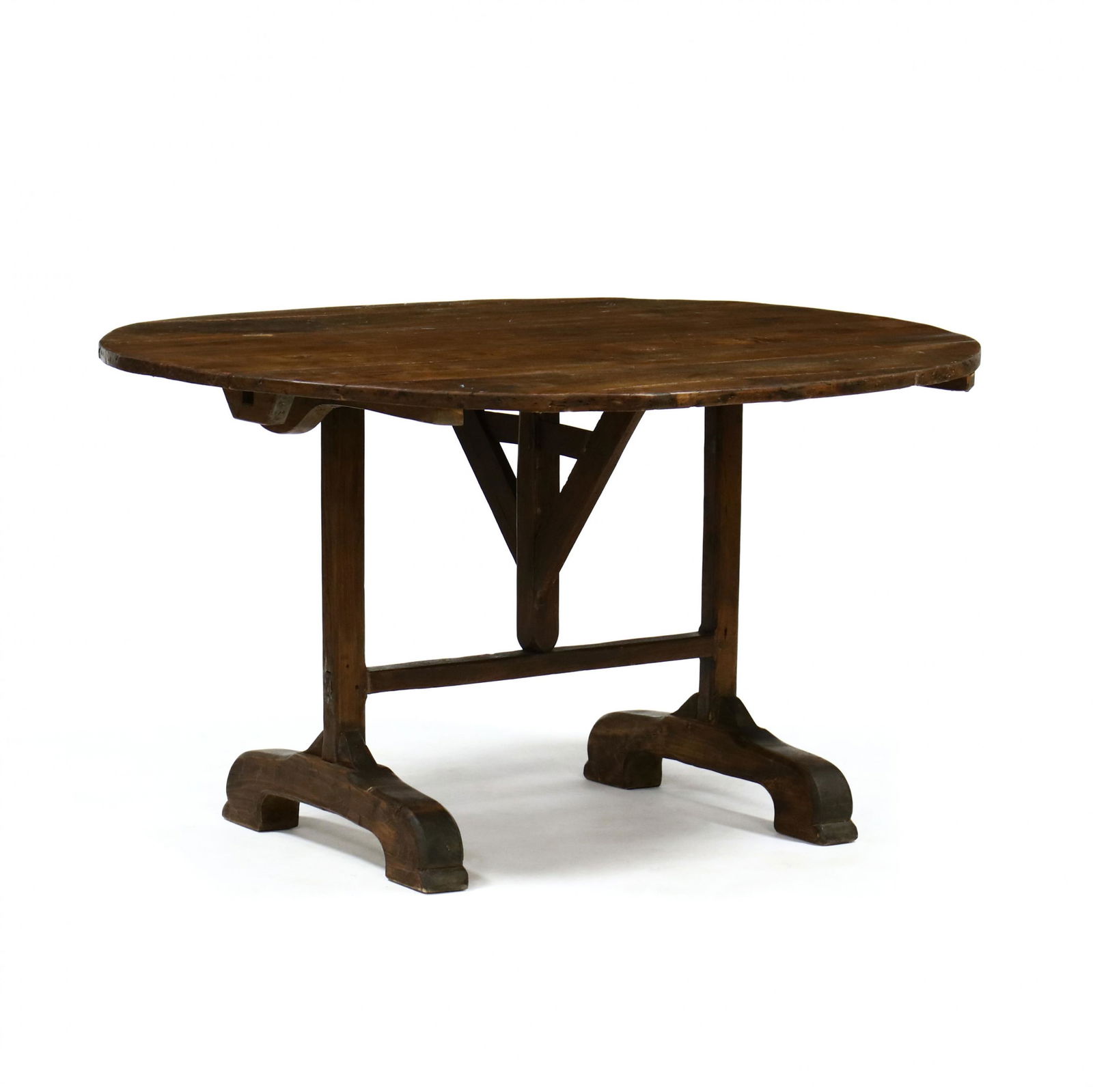 Vintage French Wine Tasting Tilt-Top Table: Vintage French Wine Tasting Tilt-Top Tablefirst half 20th century, oval tilt top with a trestle base. 27 x 52 x 47 in. From the collection of Mr. Bob McKinnon, Newton, North Carolina Additional high-r