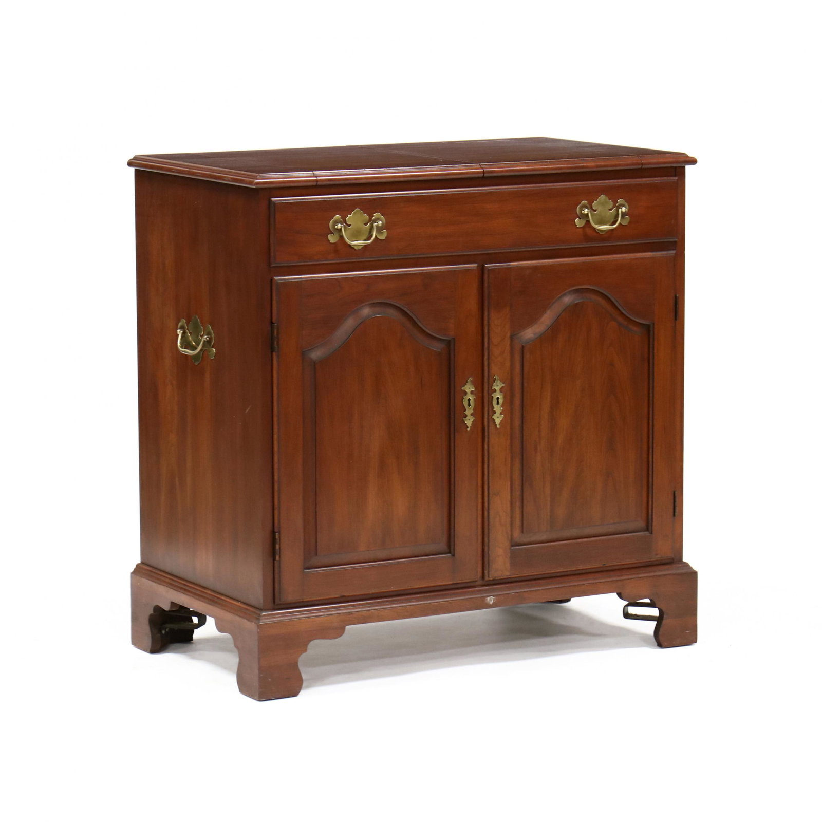 Henkel Harris, Cherry Server: Henkel Harris, Cherry Server late 20th century, linen label to drawer interior, rectangular top with double lift lid with serving surface, upper long drawer with divided flatware sections, above two h
