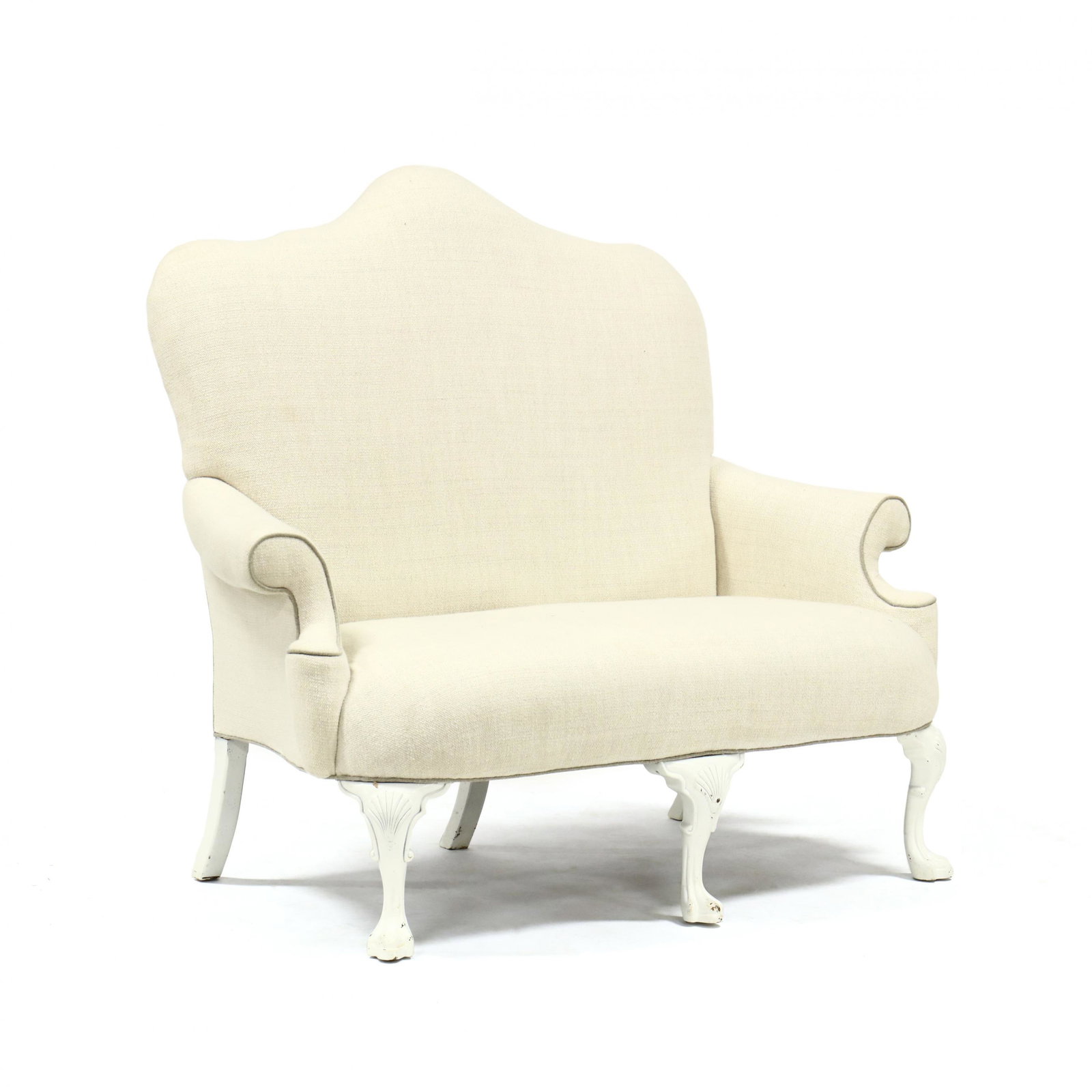 Spanish Style Over Upholstered Settee: Spanish Style Over Upholstered Settee late 20th century, over upholstered frame, tall shaped back, scrolled arms, raised on cabriole legs with trifid feet. 52 x 56 x 36 in. From the collection of Mr. 