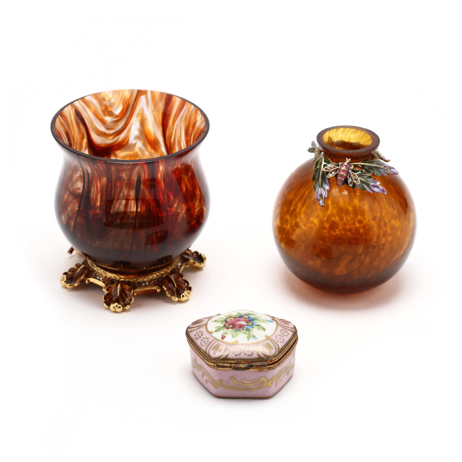 Three Pieces by Jay Strongwater and Limoges: Three Pieces by Jay Strongwater and Limoges including a glass, enamel and metal footed votive holder signed Jay Strongwater; a gold fleck amber glass vase with metal and enamel mount rim (appears unma