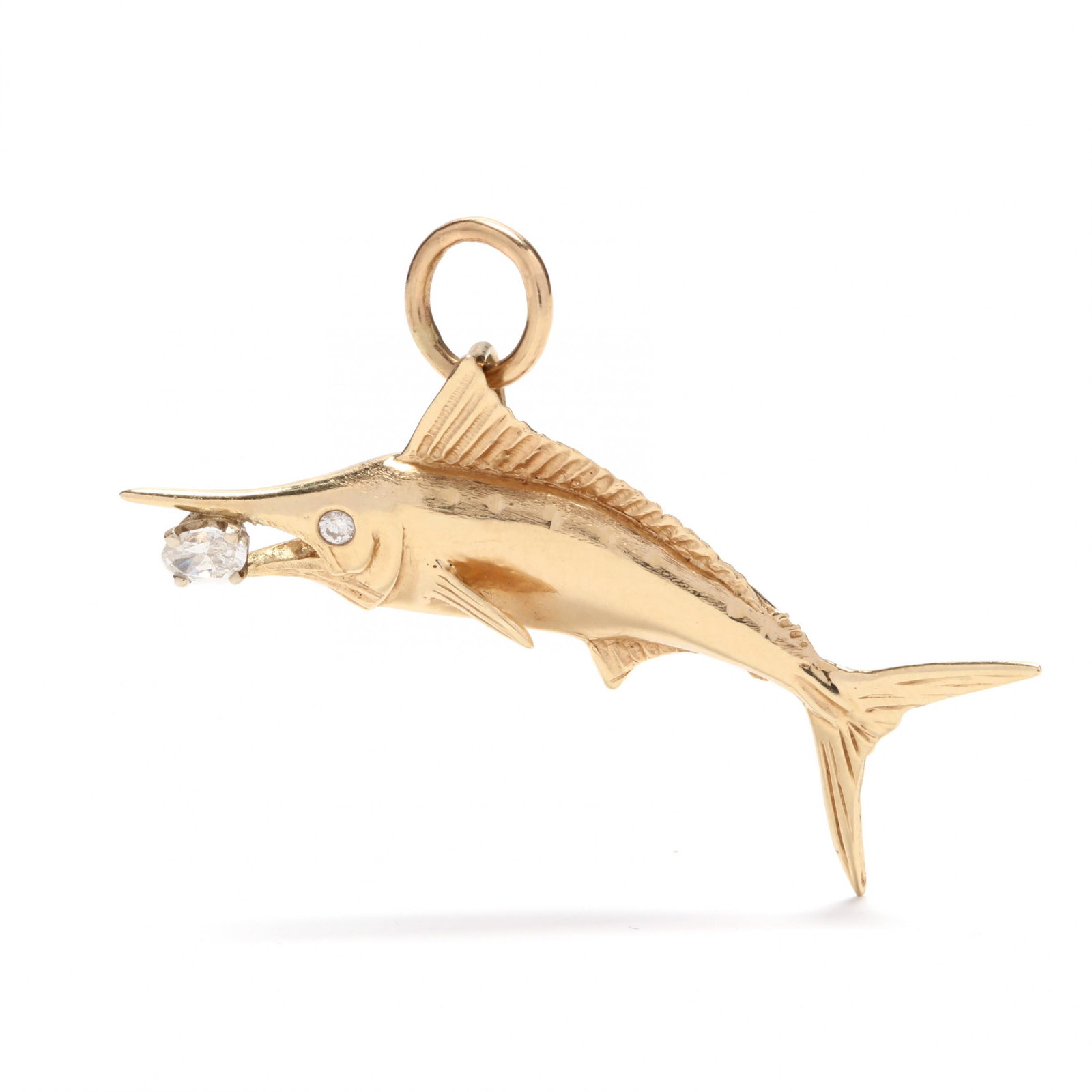 14KT Gold and Diamond Marlin Motif Pendant / Charm: 14KT Gold and Diamond Marlin Motif Pendant / Charm designed in high polish yellow gold and set with an oval cut diamond weighing approximately .21 carat (H color, VS2 clarity) and with a diamond melee