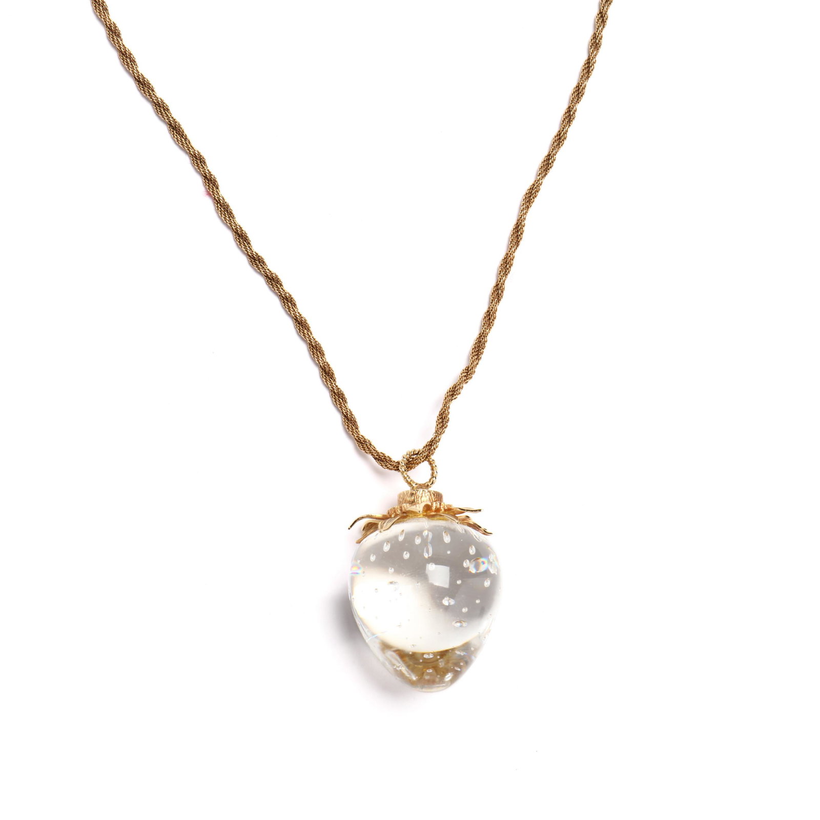 Gold and Crystal Strawberry Pendant Necklace, Steuben: Gold and Crystal Strawberry Pendant Necklace, Steuben the crystal strawberry pendant with air trapped seeds and a textured gold calyx stamped 18K and signed S for Steuben and with fixed rope twist bai