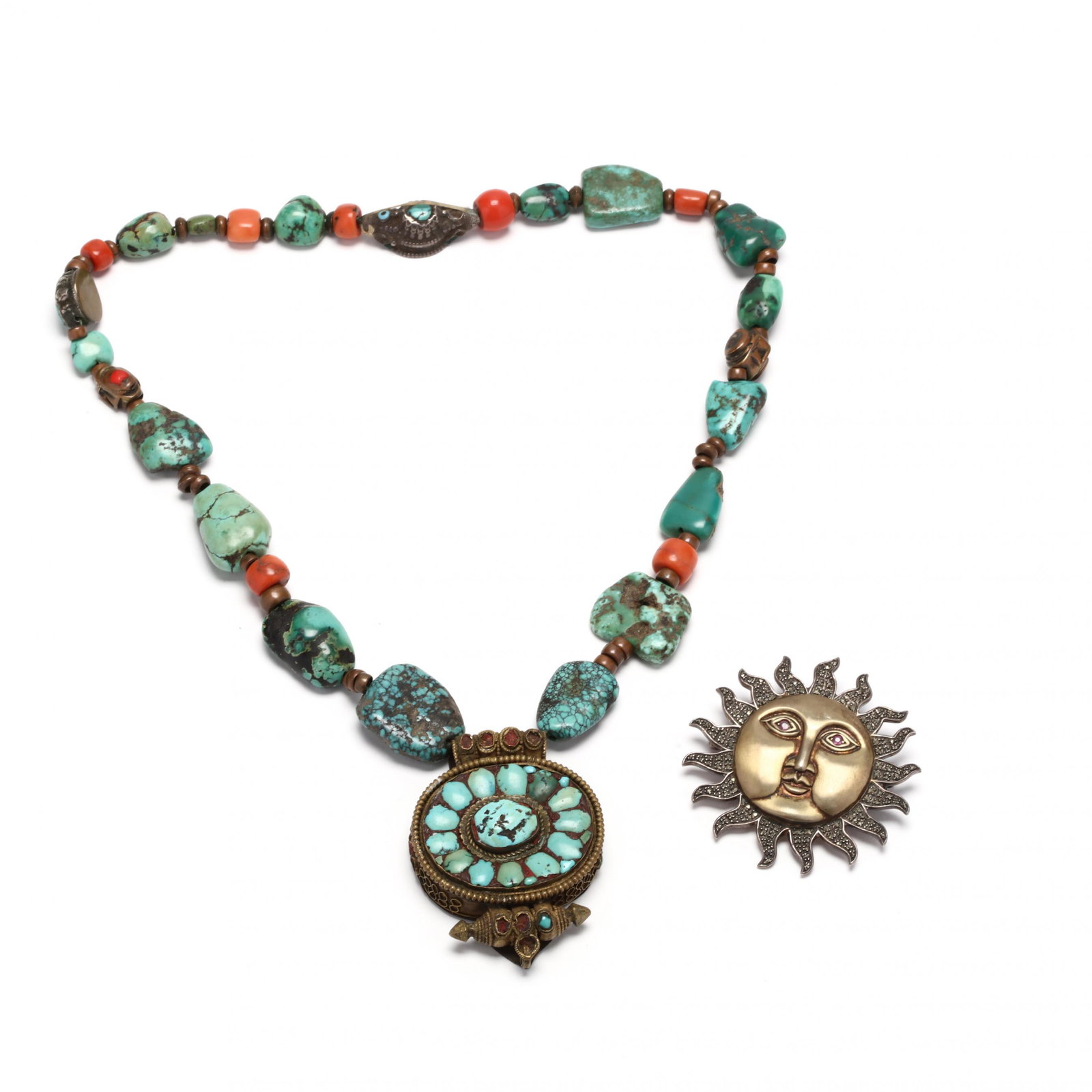 A Sterling Silver Brooch and Turquoise Necklace: A Sterling Silver Brooch and Turquoise Necklace to include: a sterling silver sun motif brooch set with round ruby eyes and marcasite detailing, stamped VINTAGE / STERLING (2 3/8 in.); and a tumbled t