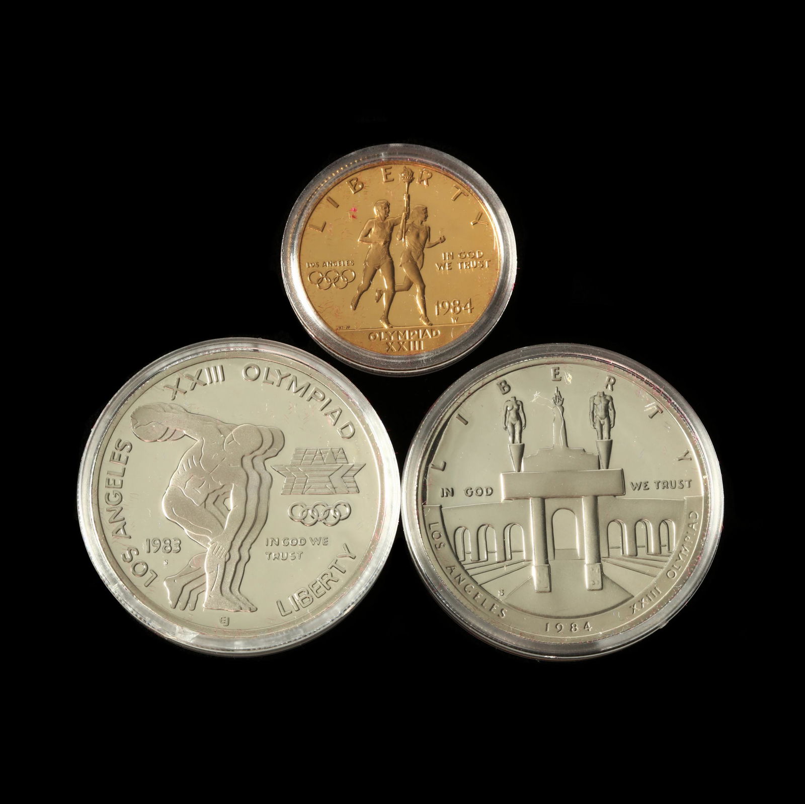 1984 United States Silver and Gold Los Angeles Olympic: 1984 United States Silver and Gold Los Angeles Olympic Proof Setthree coins to consist of a $10 1984-W gold eagle, a 1983-S silver dollar, and a 1984-S silver dollar; presented in their original U.S.