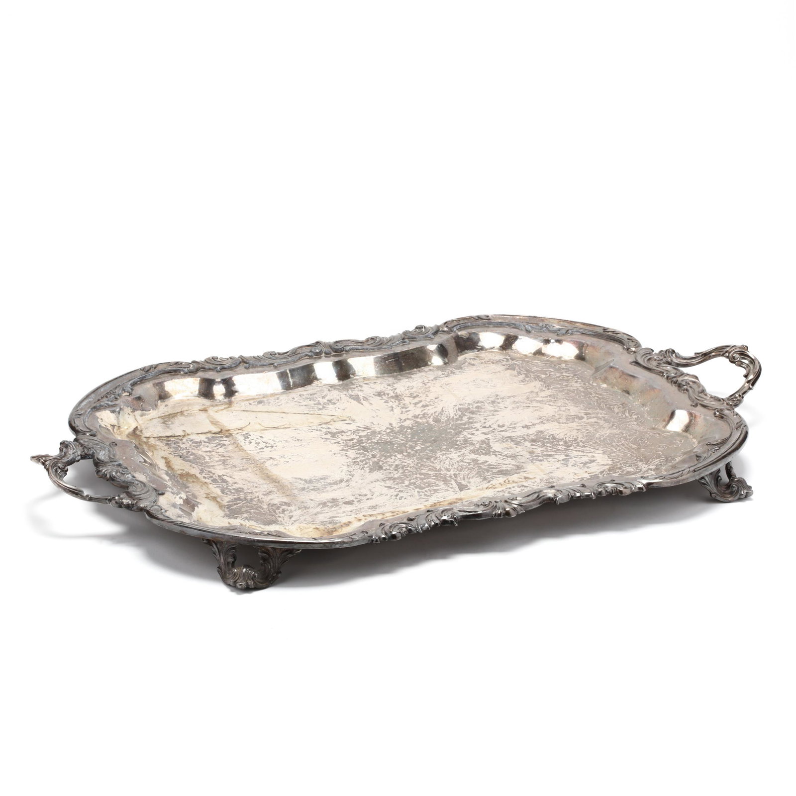 Vintage Silverplate Waiter: Vintage Silverplate Waiter mark of F. B. Rogers, double handled, foliate engraving to well, raised on four scrolled bracket feet, no monogram. 29.5 x 18 in. Additional high-resolution photos are avail