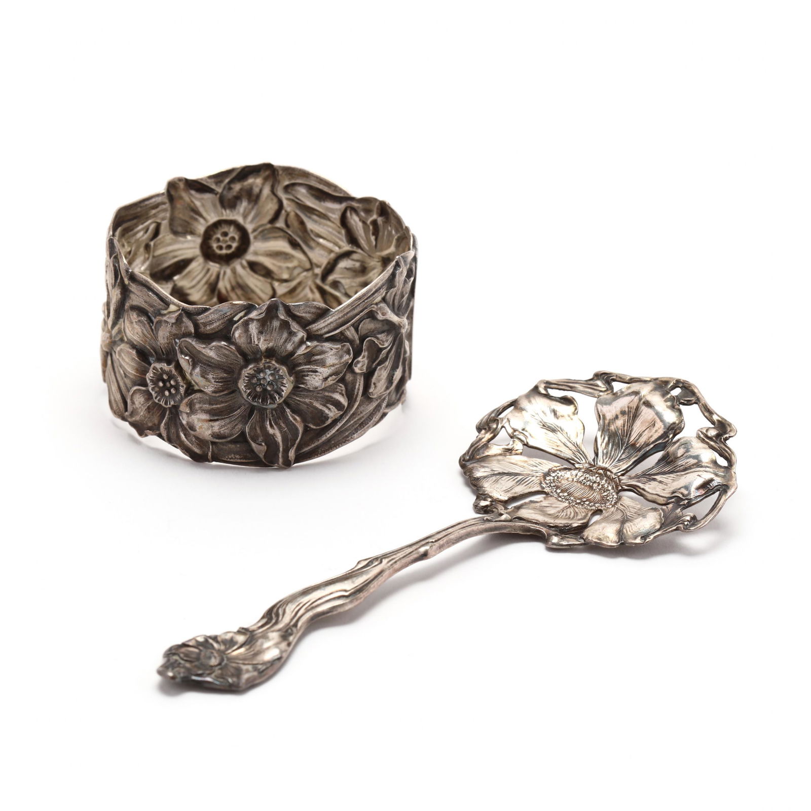 Shiebler Sterling Silver Napkin Ring & Bon Bon Scoop: Shiebler Sterling Silver Napkin Ring & Bon Bon Scoopthe napkin ring with daffodil motif, model number 9308, no monogram (2 1/8 in. diameter); and the bon bon spoon with floral motif, no monogram (4.75