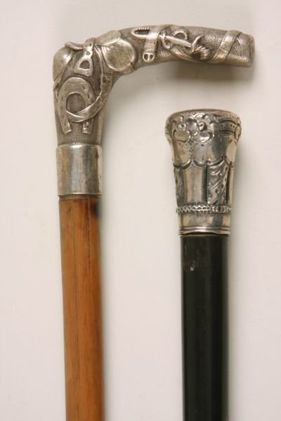 Two Antique Walking Sticks With Silver Handles,