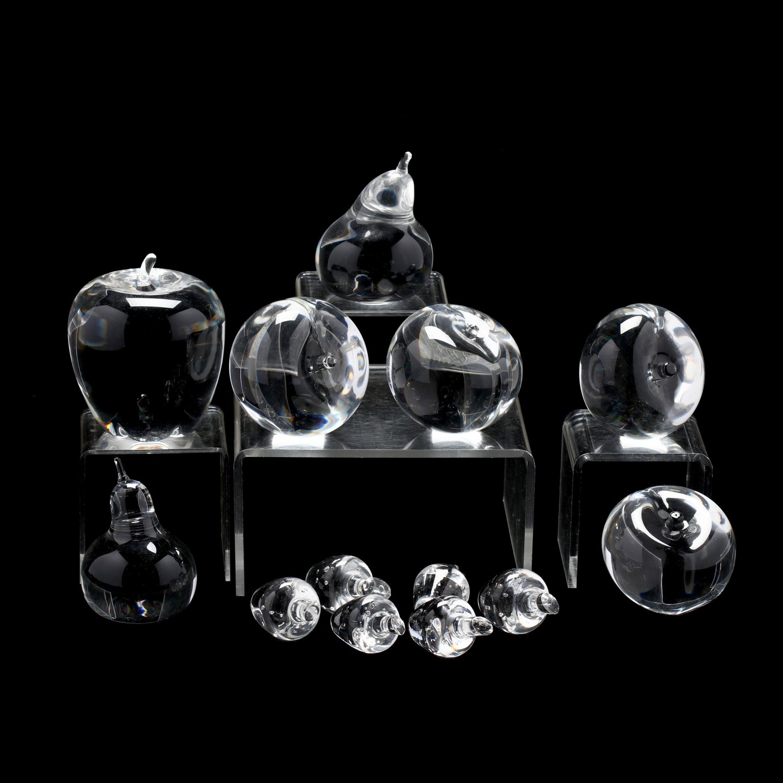 Steuben, (13) Pieces of Crystal Fruit: Steuben, (13) Pieces of Crystal Fruit 1940-70s including (1) apple, (4) peaches, (2) pears and (6) strawberries, signed. Tallest 4 in. From the Estate of the late Peggy Futrelle Nowell, Raleigh and Pi