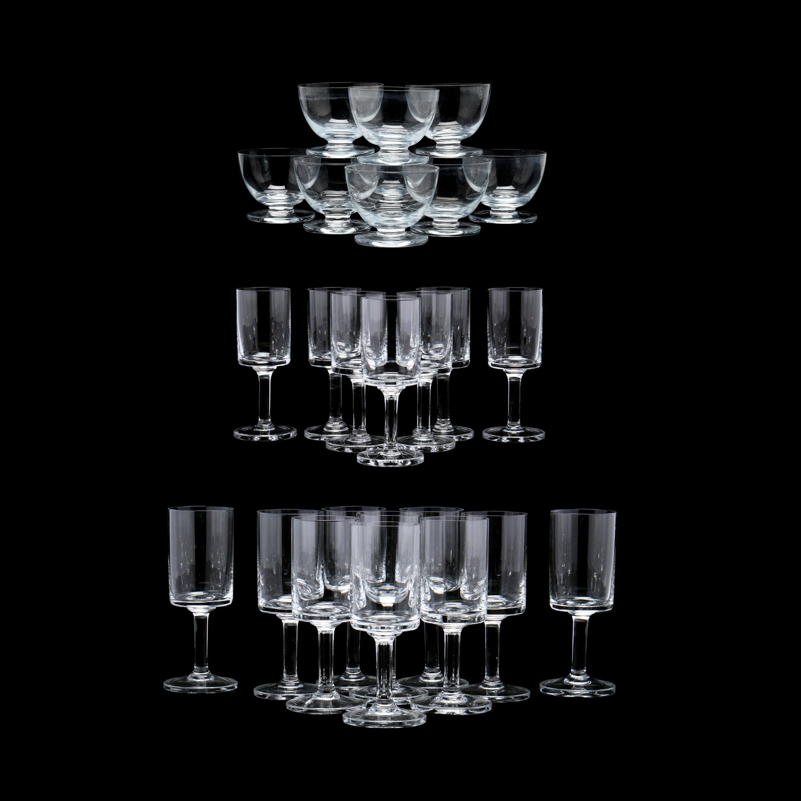 Dansk, (26) Glass Stems: Dansk, (26) Glass Stemsdesigned by Jens Quistgaard, including (10) water goblets (8 in.), (7) wine stems (6.5 in.), (9) sherbets (9.75 in.), faintly marked. Additional high-resolution photos are avai