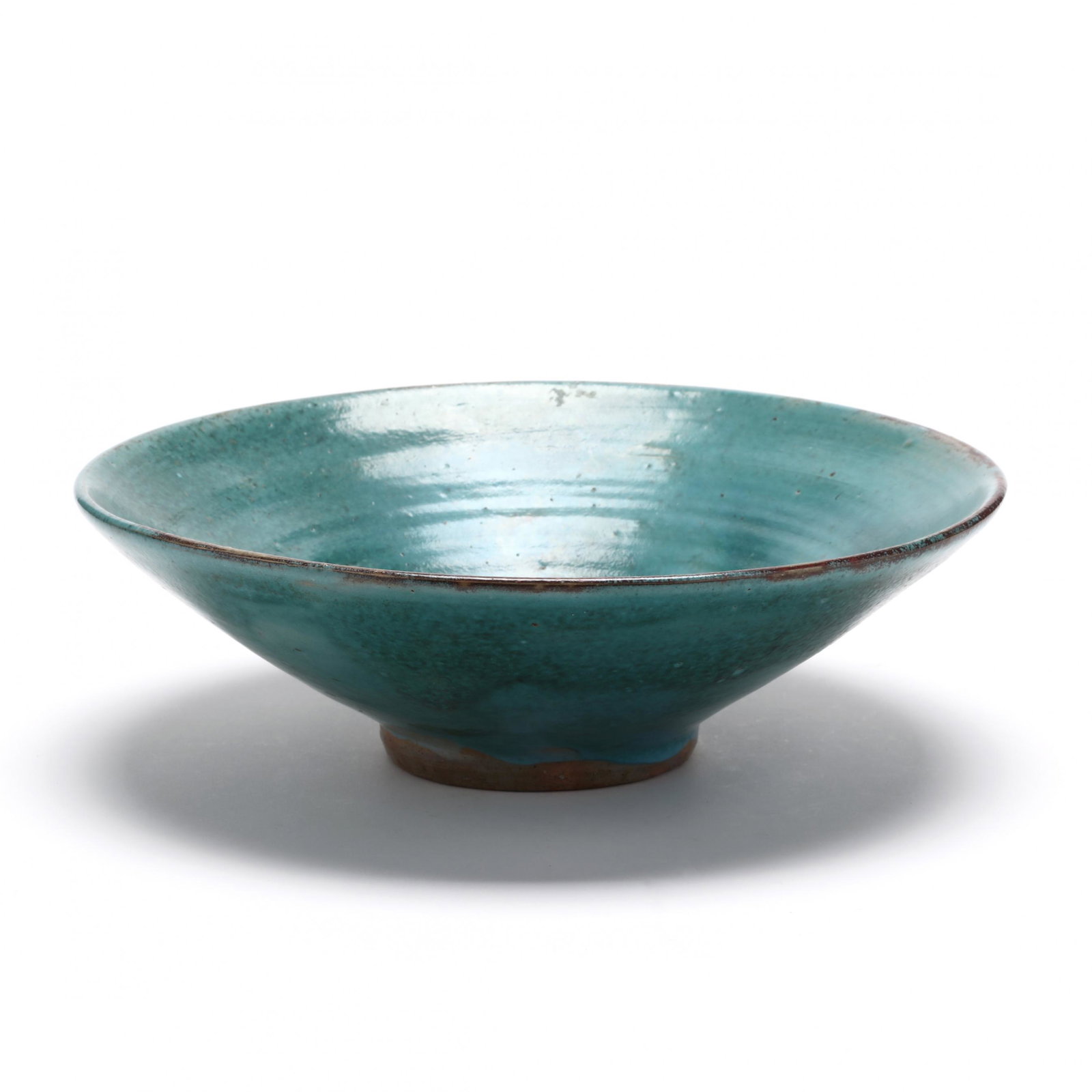 NC Pottery, Jugtown Chinese Blue Korean Bowl: NC Pottery, Jugtown Chinese Blue Korean Bowl Seagrove, North Carolina, circa 1930's - 1940's, circular Jugtown Ware stamp to the bottom, stoneware with aqua blue glaze and some areas of red highlights