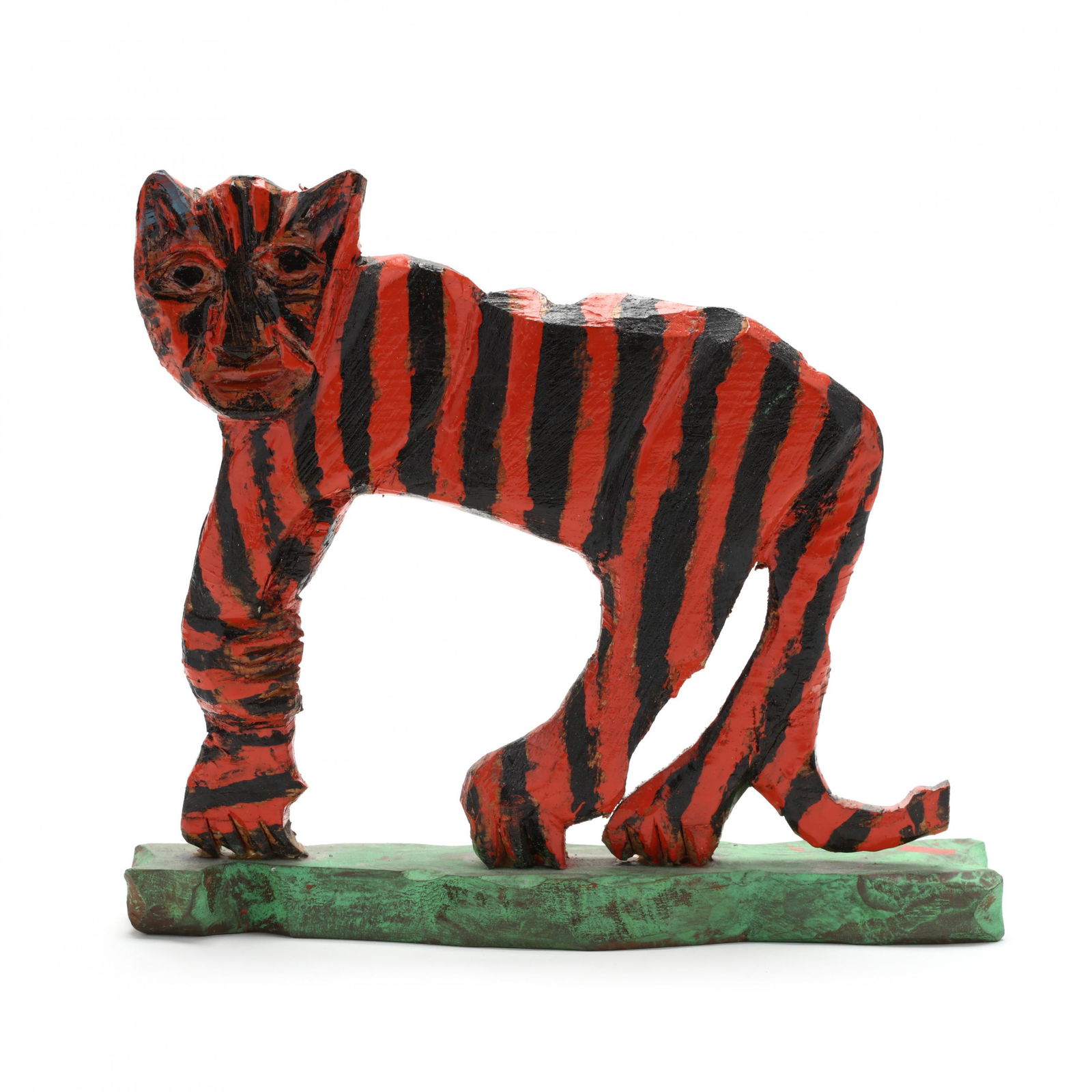 Elijah Pierce (American, 1892-1984) Folk Art Carving of: Elijah Pierce (American, 1892-1984) Folk Art Carving of a Standing Tigercarved in a three dimensional style, painted and attached to a shaped platform, signed on the underside "E. Pierce 9-12-1979". 8