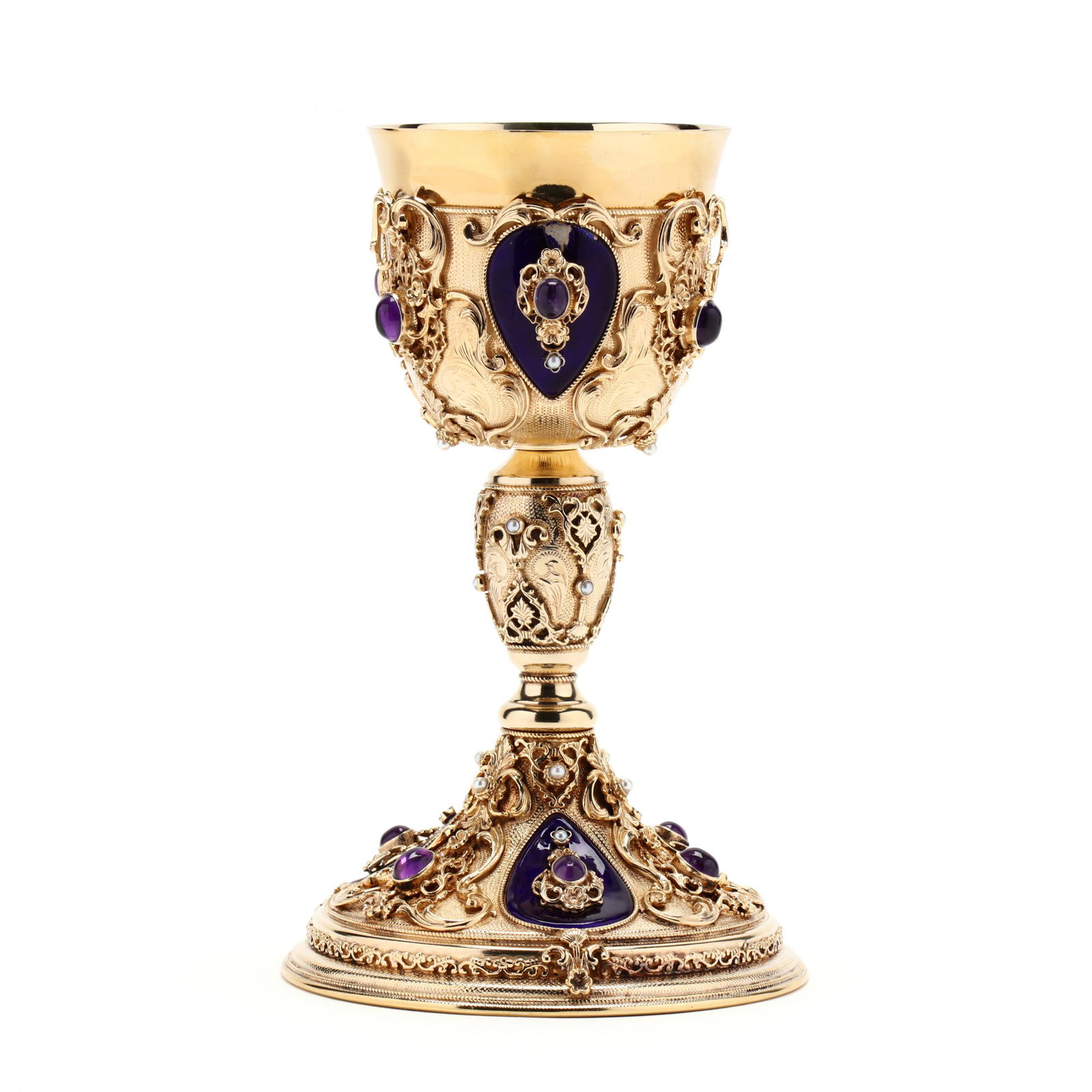 A Hungarian Silver Gilt, Enameled & Gem Set Chalice: A Hungarian Silver Gilt, Enameled & Gem Set Chalice sterling silver, late 20th century, hallmarked, set with twelve amethyst cabochons and twenty-one seed pearls, with ornate filigree and engraved orn