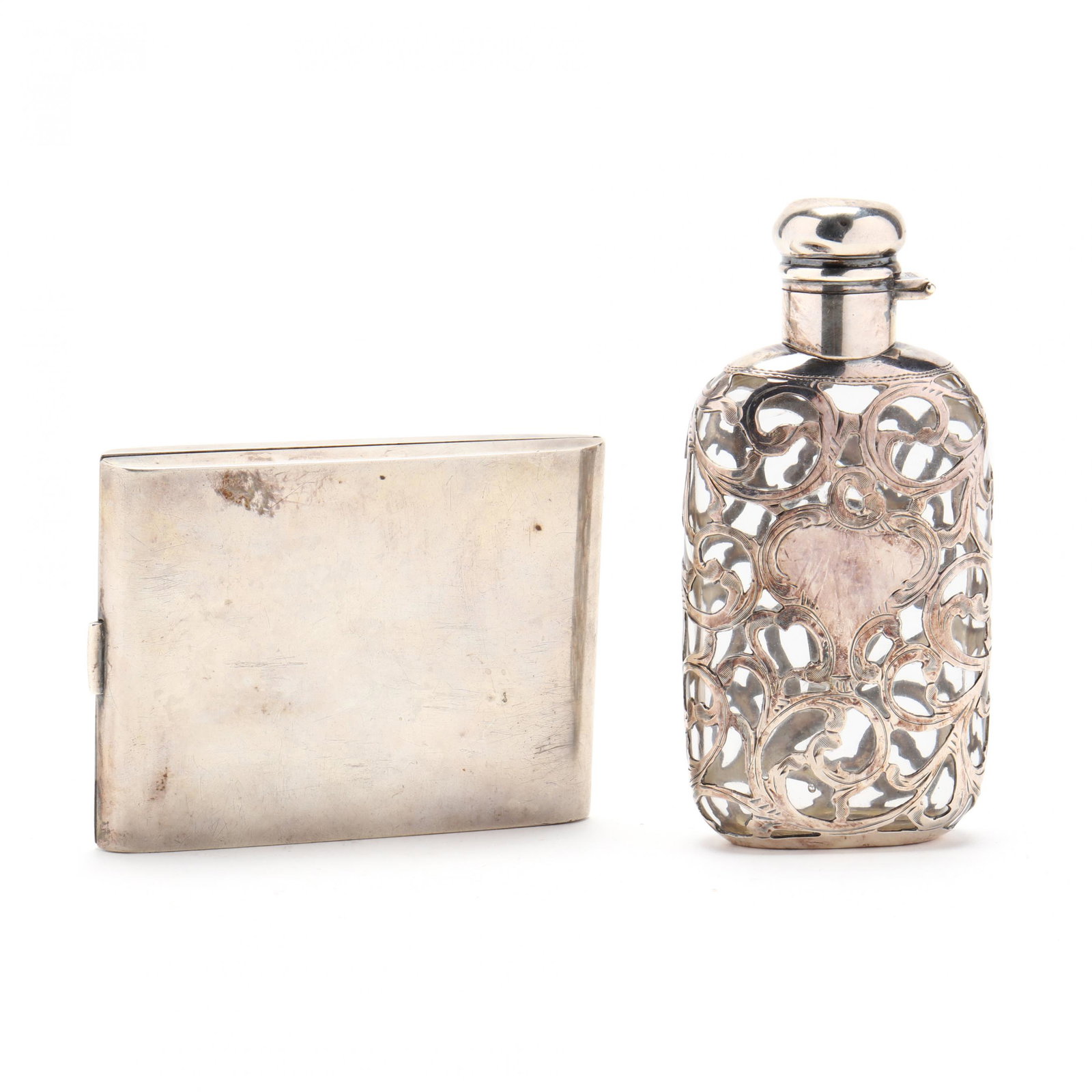 Sterling Silver Cigarette Case and Flask: Sterling Silver Cigarette Case and Flaskthe cigarette case with mark of R. Blackinton & Co., no monogram (3.6 troy oz., 3.75 x 3 in.) (some minor denting); the flask with silver overlay and mark of Al