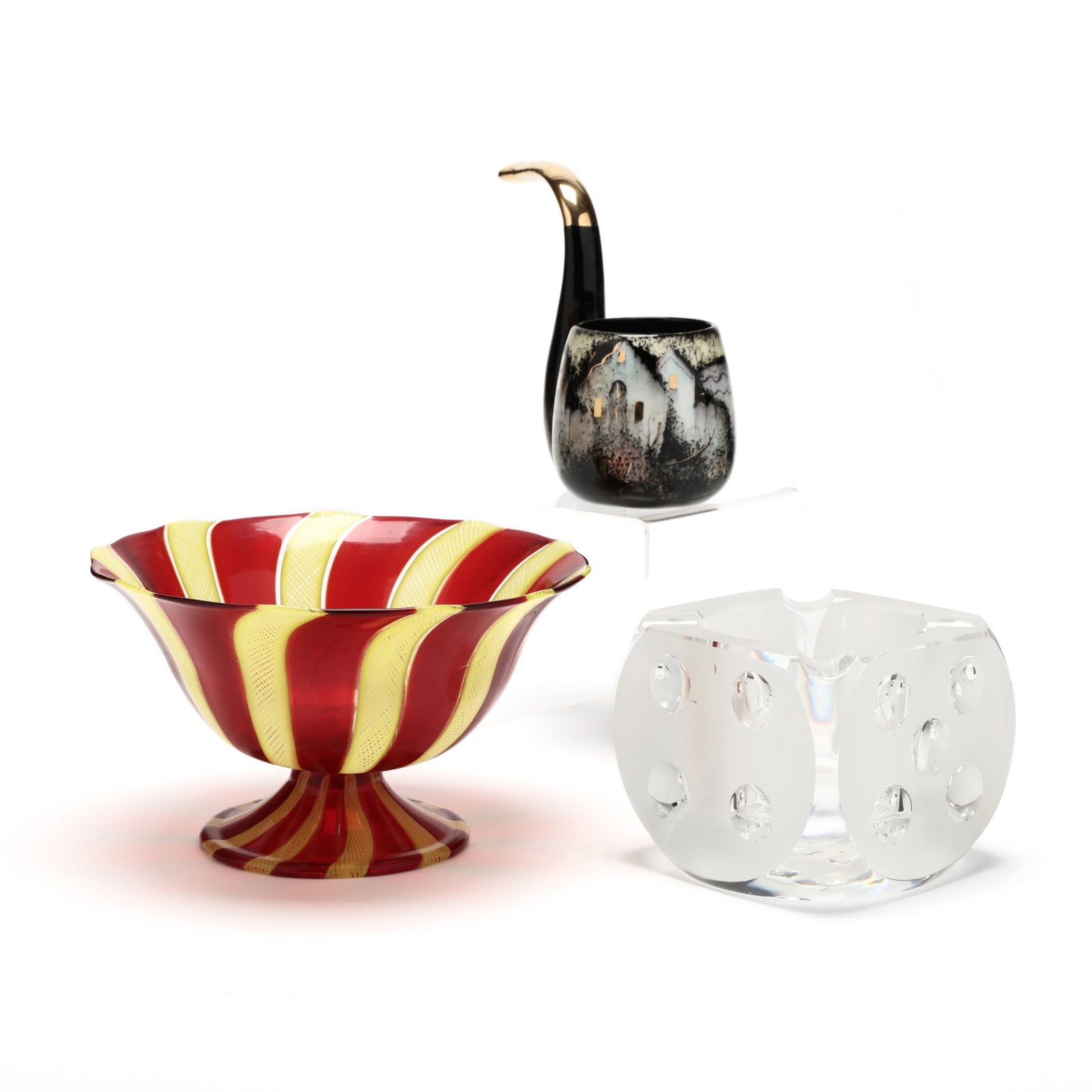 Three Modern Accessories: Three Modern Accessories 1960s, including a Murano latticino glass bowl in red and yellow, a frosted and cut glass Spode die ashtray, and a Sascha Brastoff ceramic faux pipe, marked. Tallest 5.25 in. 