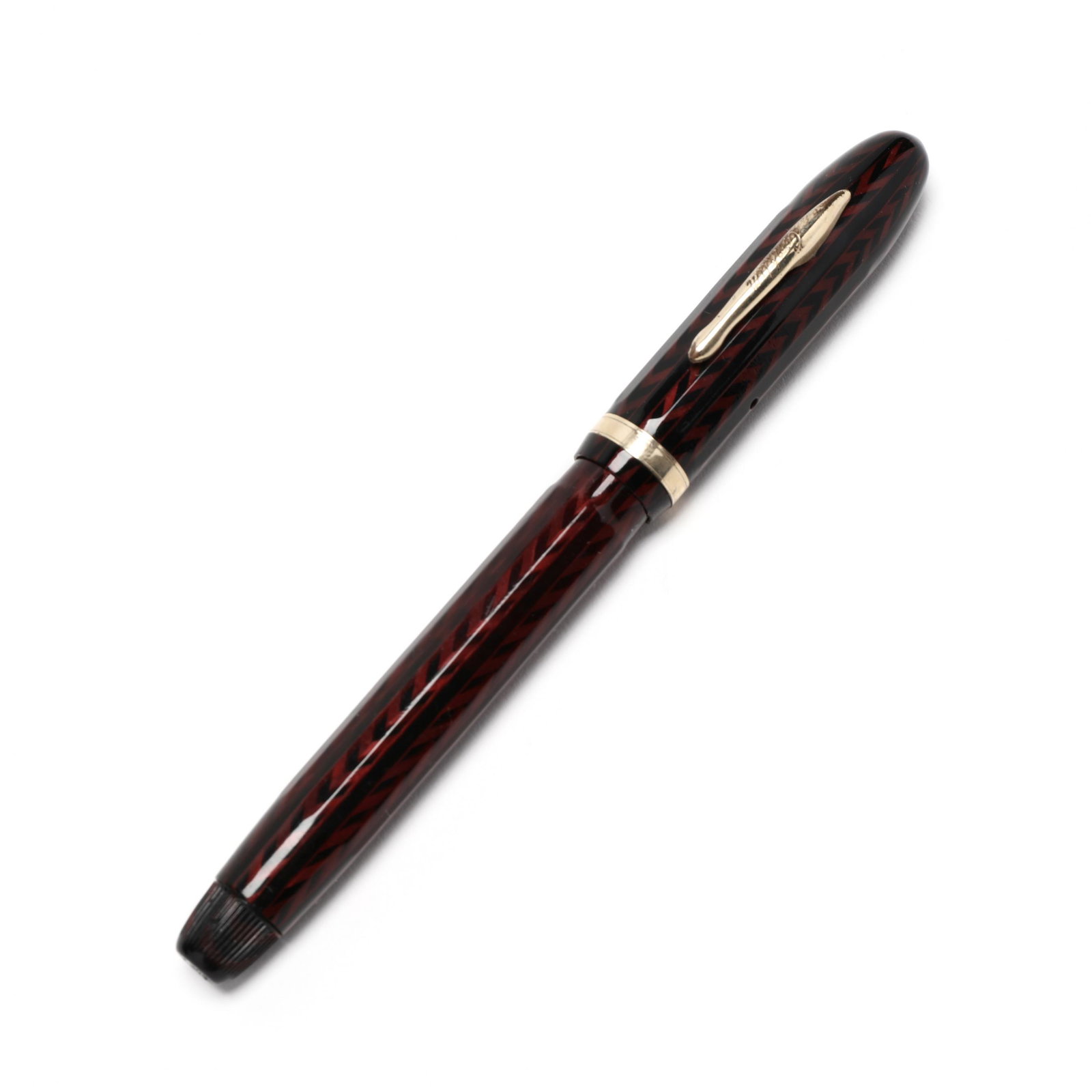 Vintage Conklin Nozak Fountain Pen: Vintage Conklin Nozak Fountain Pen 1930s, red/black herringbone acrylic with gold tone mounts, 14k gold nib. 5.25 in. Collection of Arthur M. Gerber, M.D., Fearrington Village, North Carolina Addition