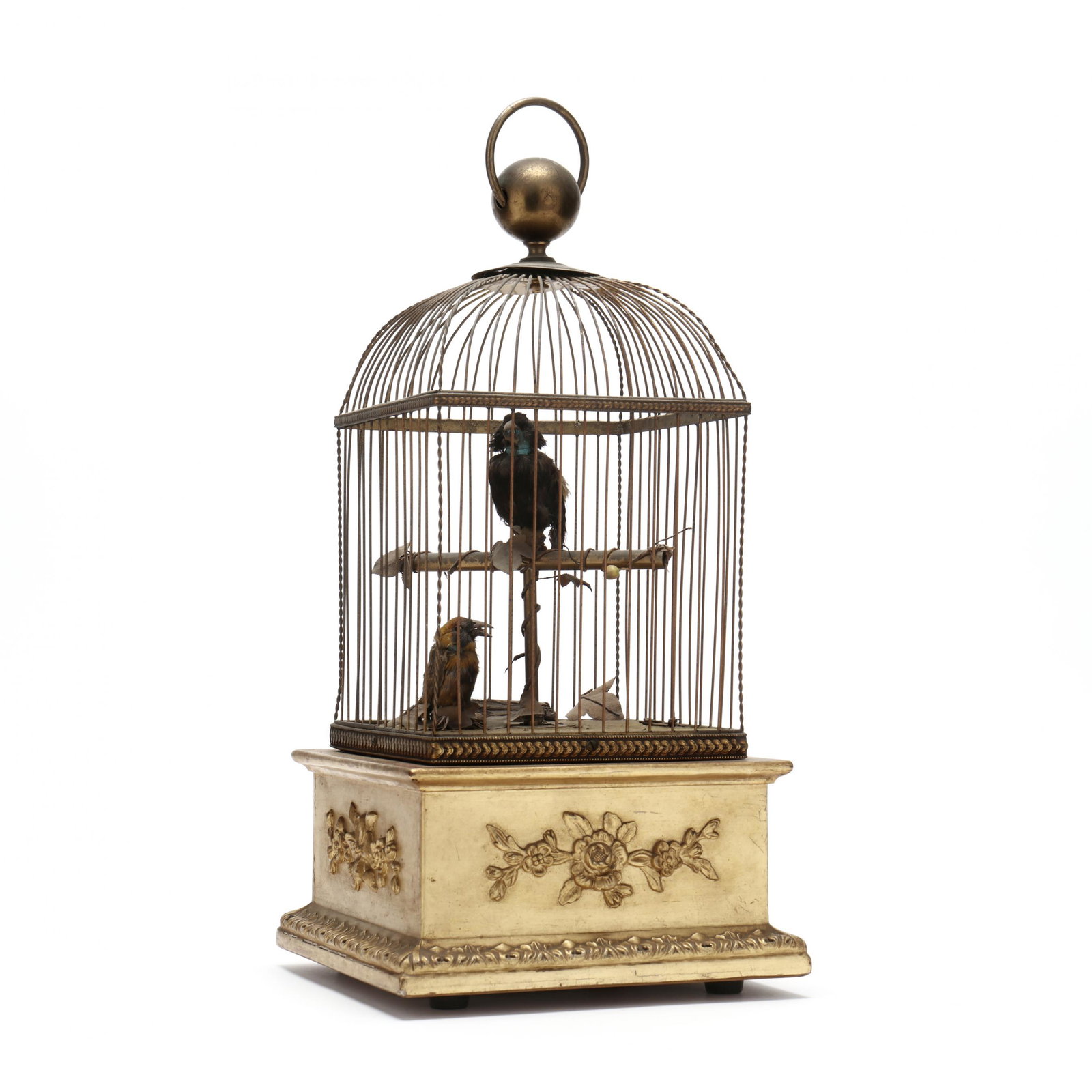 Antique French Two Singing Bird Automaton: Antique French Two Singing Bird Automatonearly 20th century, unmarked but very probably French, feathered birds, one upon a brass perch, fabric leaves, gilt brass cage, the base with applied rosettes,