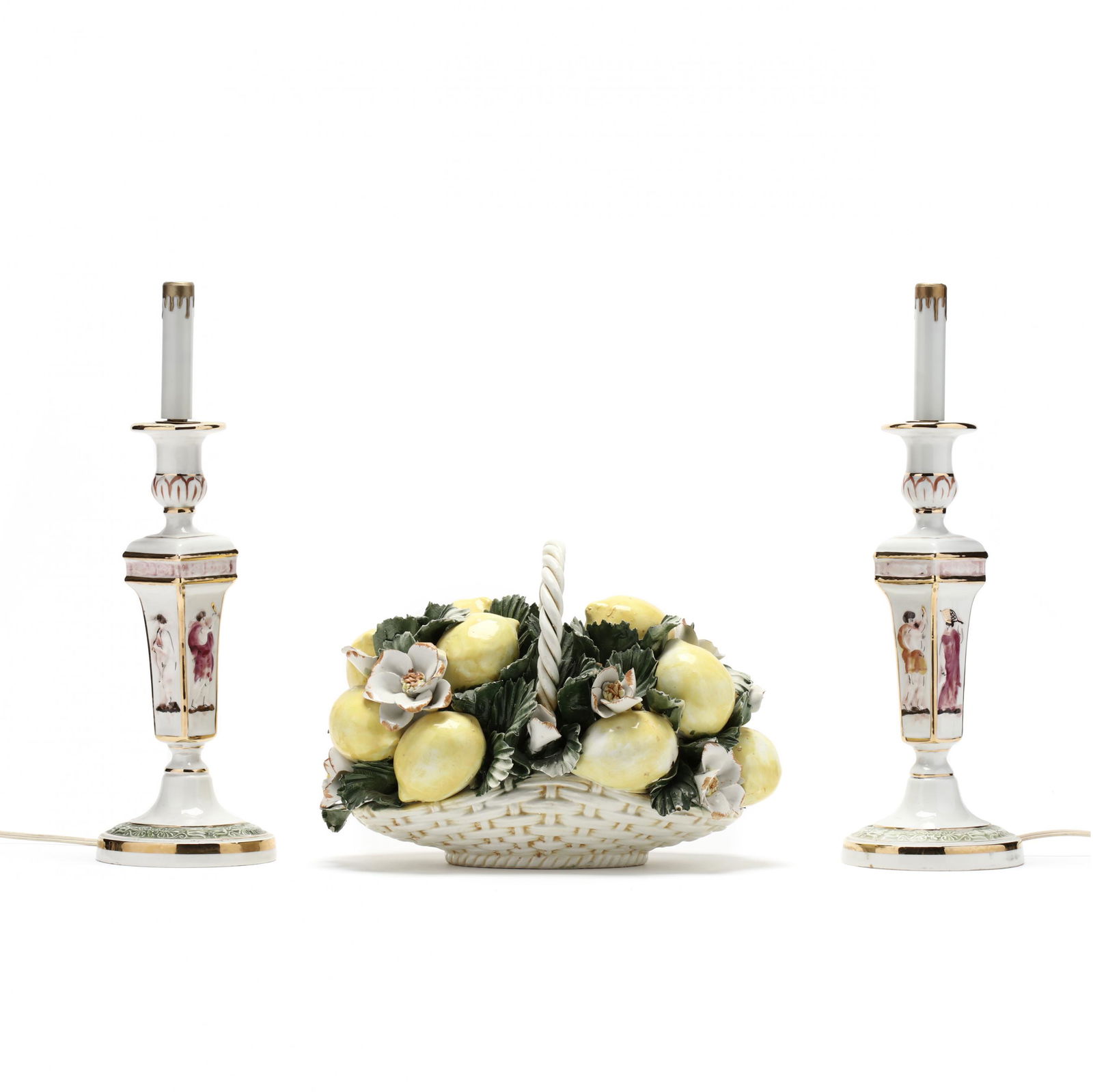 Italian Pottery Group: Italian Pottery Groupa pair of Capodimonte table lamps, the paneled sides decorated with bas relief classical figures, lacking shades (16.25 in.) and a majolica centerpiece composed of a handled baske