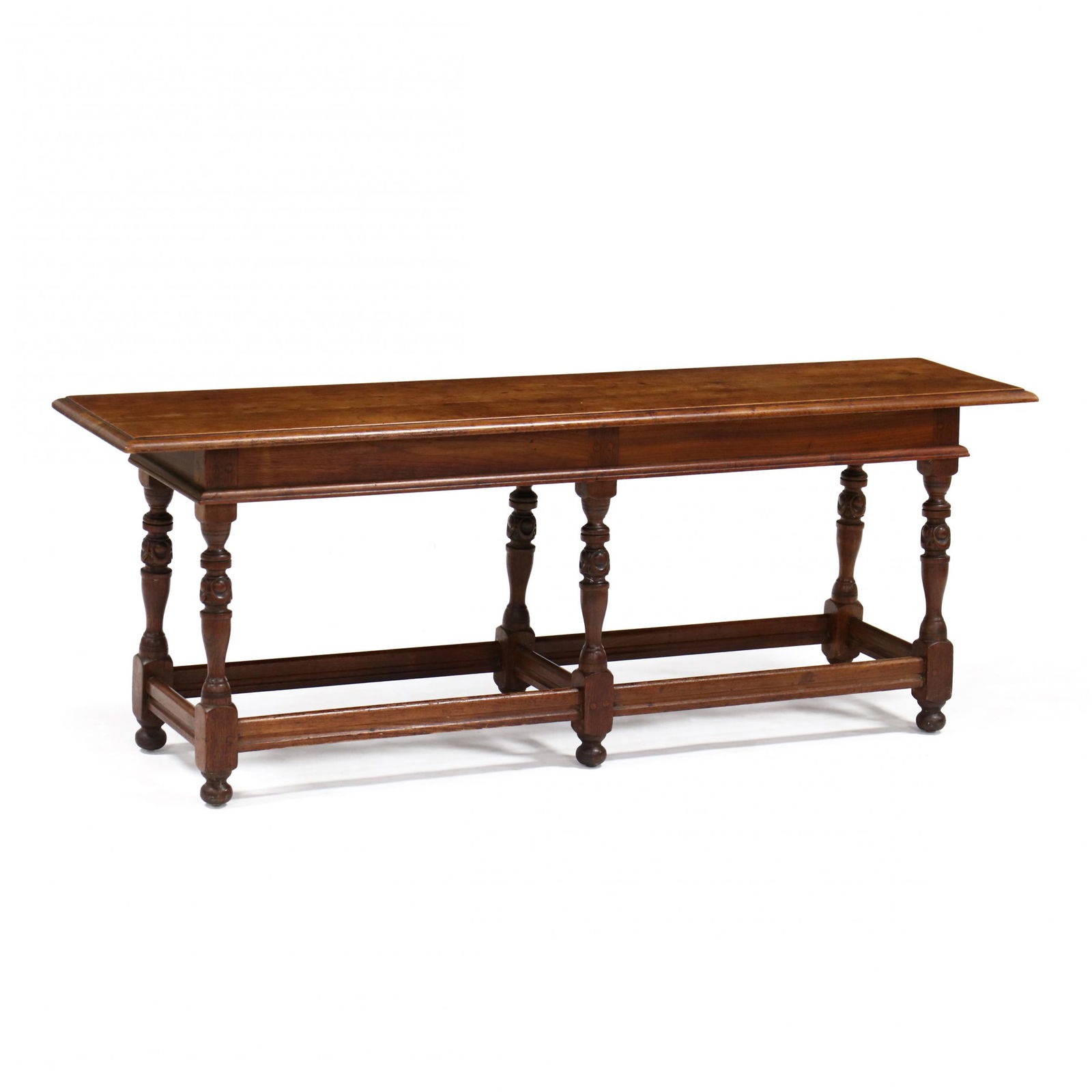 Kittinger, William and Mary Style Bench: Kittinger, William and Mary Style Benchcirca 1920, walnut, rectangular top with molded edge, raised on six turned and carved legs with stretcher base, labeled. 20 x 54 x 12.5 in. Additional high-reso