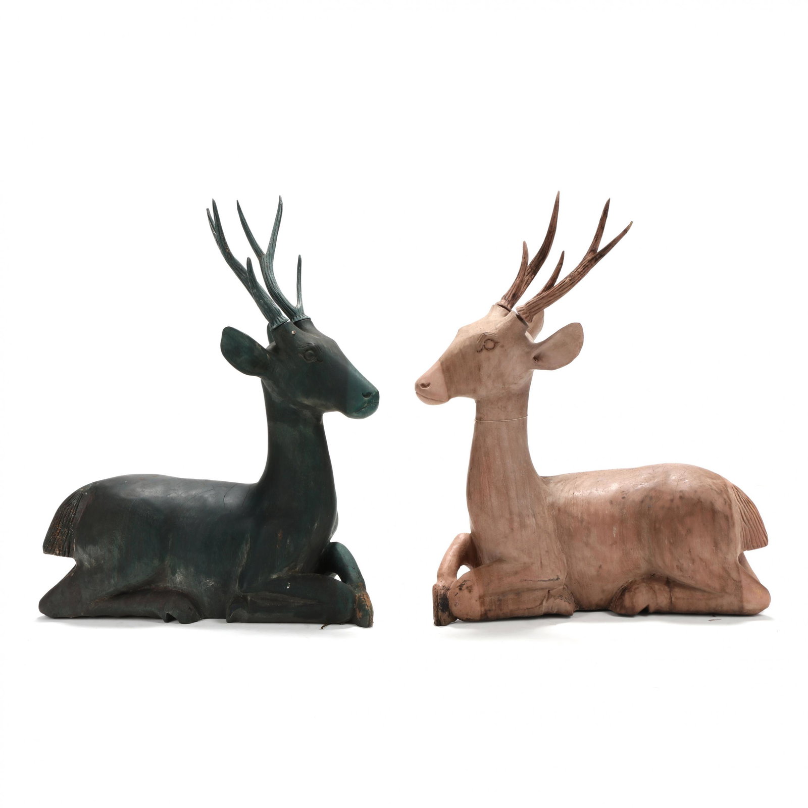 Pair of Southeast Asian Carved Wood Deer: Pair of Southeast Asian Carved Wood Deer carved teak in pink and green finishes, with removable antler. 22 x 19 x 6 in. Additional high-resolution photos are available at www.lelandlittle.com