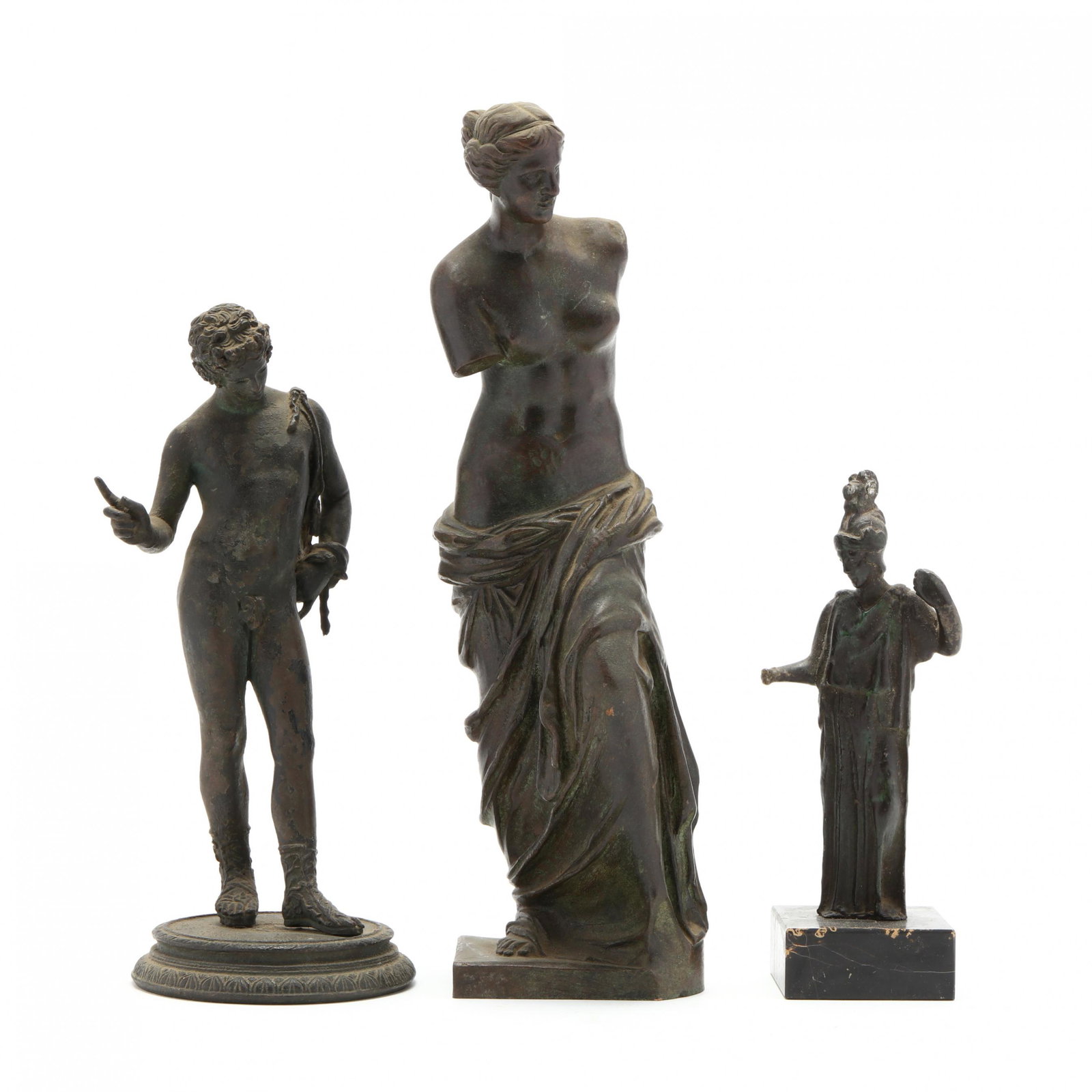 Three Grand Tour Bronzes: Three Grand Tour Bronzes late 19th century, including Venus de Milo, David, and a painted white metal Greco-Roman warrior on a marble plinth, unmarked. Tallest 11 in. From the Collection of Patricia A