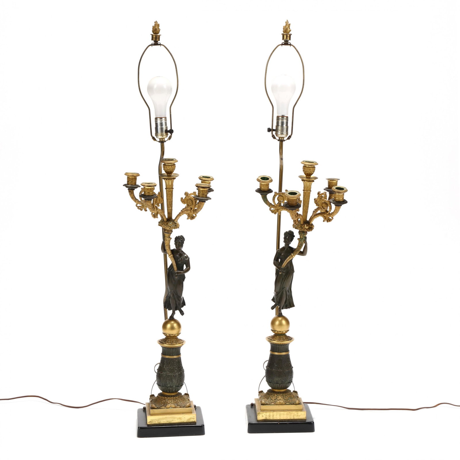 Pair of Neoclassical DorÃ© Bronze Figural Candelabra: Pair of Neoclassical DorÃ© Bronze Figural Candelabra 19th century, gilt and patinated bronze, five-light candelabra terminating in a cornucopia, supported by classically dressed figure, on acanthus 
