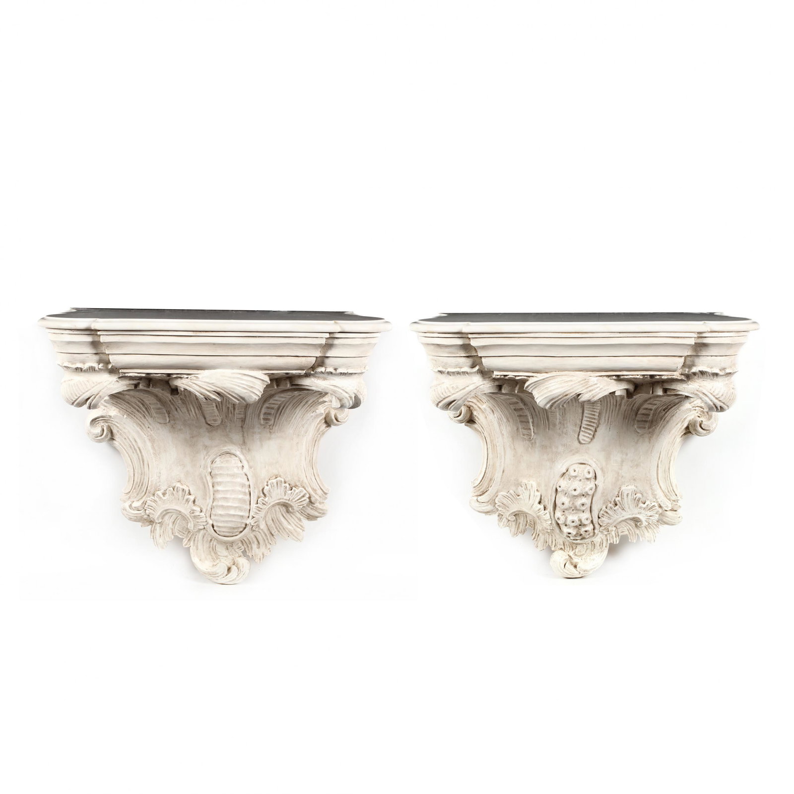 Pair of Italian Rococo Style Carved and Painted Marble: Pair of Italian Rococo Style Carved and Painted Marble Top Console Tables mid 20th century, shaped white marble top with molded edge, carved wood and composition wall-mount support. 28 x 32 x 18.5 in.