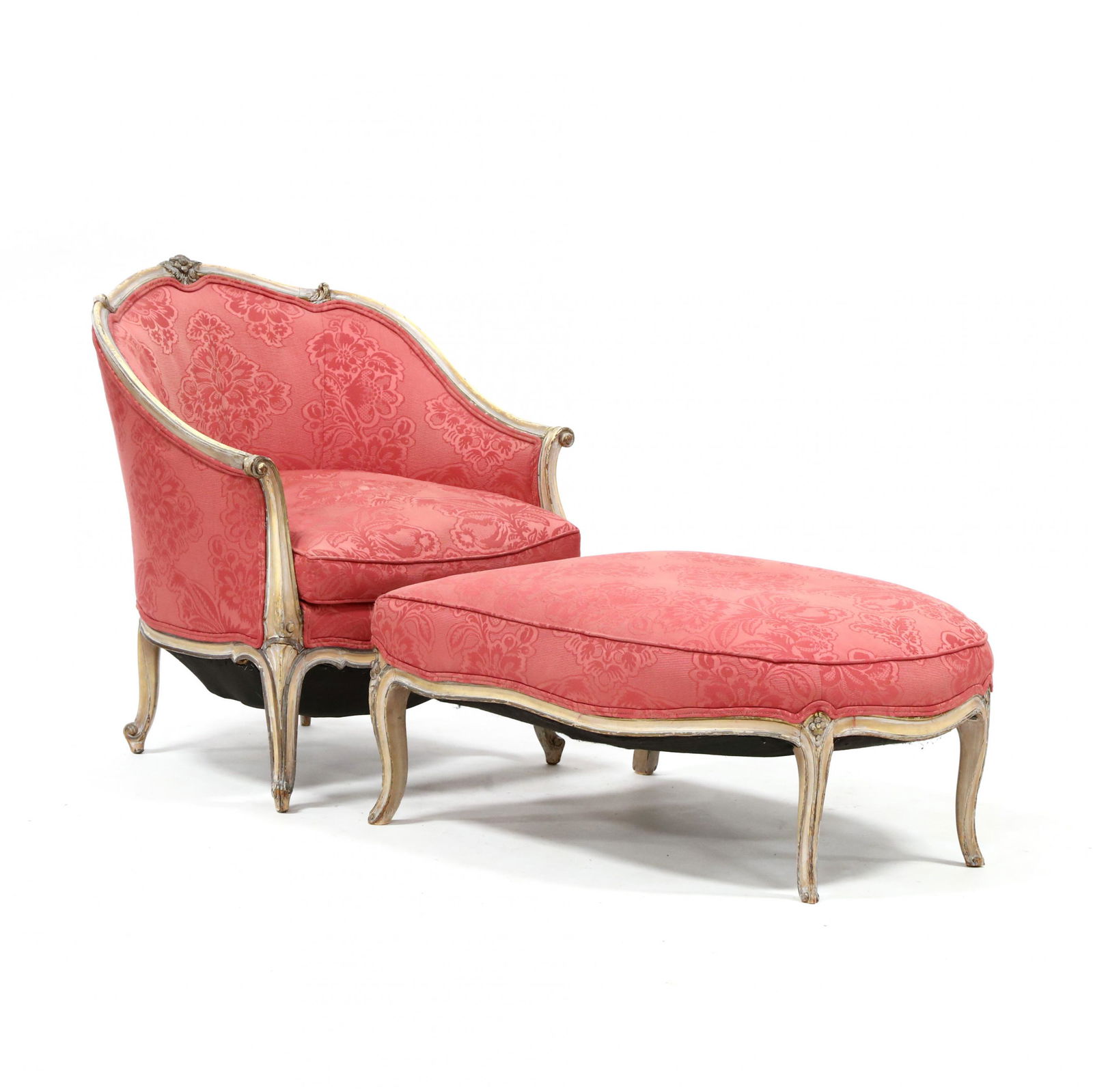Vintage French Provincial Style Carved and Painted: Vintage French Provincial Style Carved and Painted Chaise Loungemid 20th century, two-part form, carved wood frame, distressed painted surface, pink damask upholstery with loose down-filled cushion. C