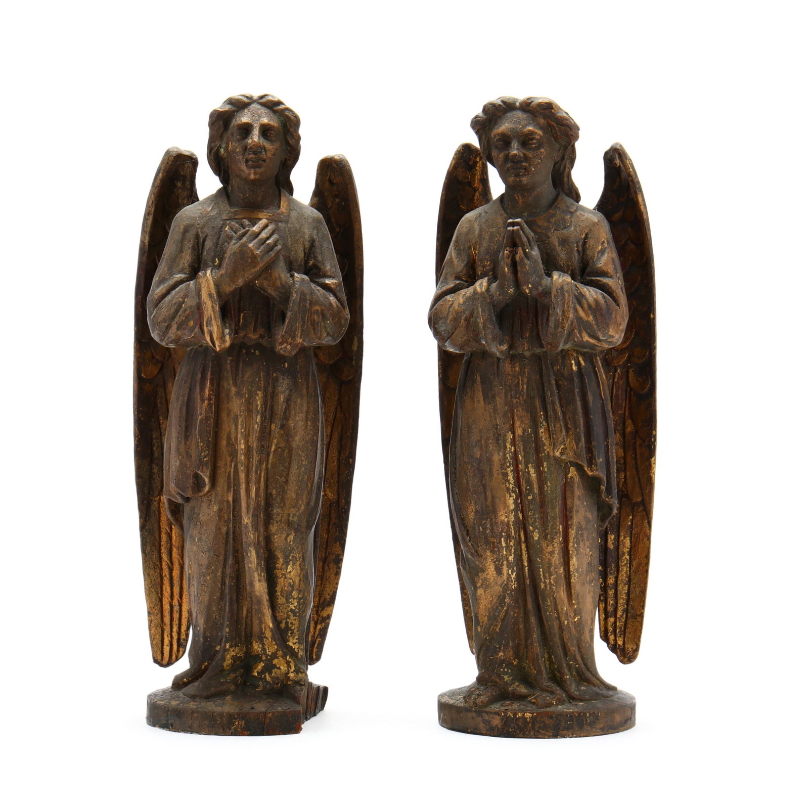 A Pair of Continental School Carved Angels: A Pair of Continental School Carved Angels circa 1900, with remnants of gold paint, each depicted in a pose of reflection and prayer. 13 5/8 in. (each) Private Collection, Durham, North Carolina Addit