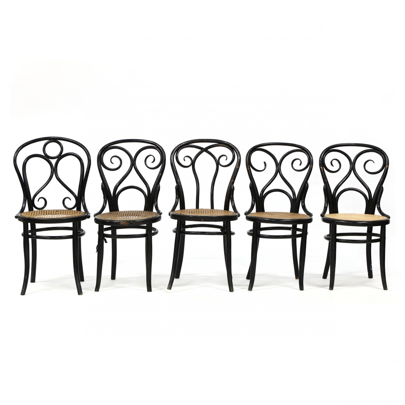 att. Thonet, Set of Five Antique Bentwood Side Chairs: att. Thonet, Set of Five Antique Bentwood Side Chairs late 19th century, ebonized bentwood frames with various patterned backs, cane seats, some with arabic script labels to underside. 36 x 17 x 16 in