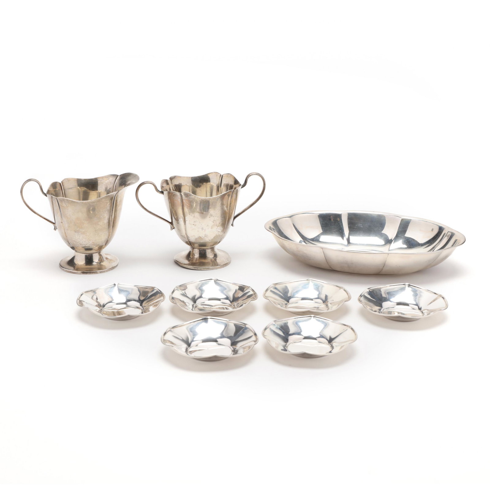 A Grouping of Sterling Silver Table Accessories: A Grouping of Sterling Silver Table Accessoriesto include: (1) sterling silver tray with fluted sides and rim, marked Whiting Manufacturing Co., model number 2070 (1 1/4 x 7 in.); (6) small sterling s