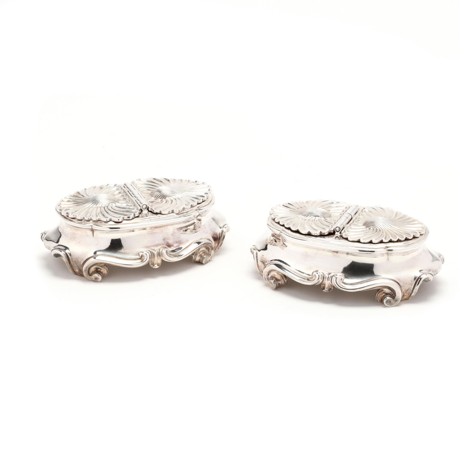A Pair of French 1st Standard Silver Double Salts, Mark: A Pair of French 1st Standard Silver Double Salts, Mark of Puiforcat each with hallmarks designating they were made for export, further marked "Puiforcat Paris / France" to underside, hinged covers wi
