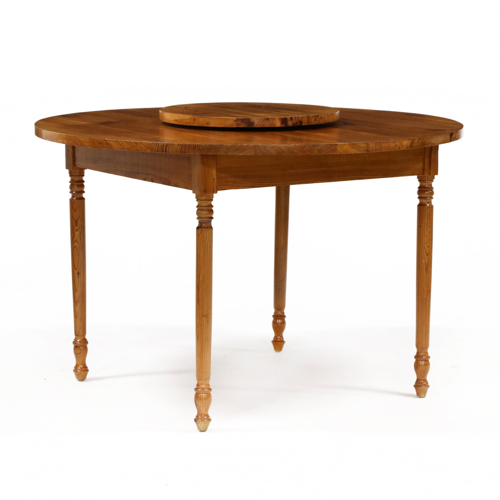 A Southern Custom Lazy Susan Dining Table: A Southern Custom Lazy Susan Dining Tablecontemporary construction from reclaimed 19th century heart pine boards, circular top, on turned legs, unmarked. 30 x 48 in. diameter Private Collection, North