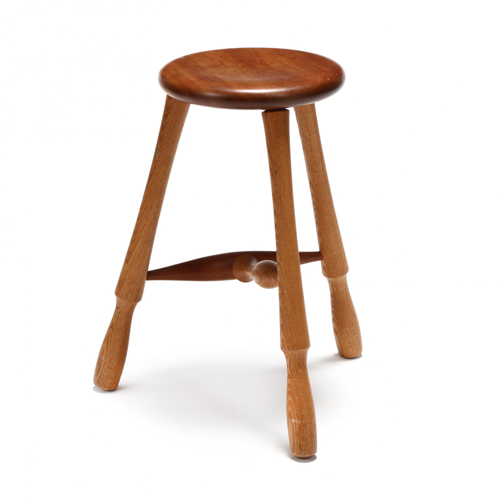 David W. Scott (NC), Bench Made Tripod Stool: David W. Scott (NC), Bench Made Tripod Stool Asheville, 1999, cherry and oak, circular seat, with turned legs, turned stretcher with foot rail, signed. 24 x 20 x 20 in. Private Collection, North Carol