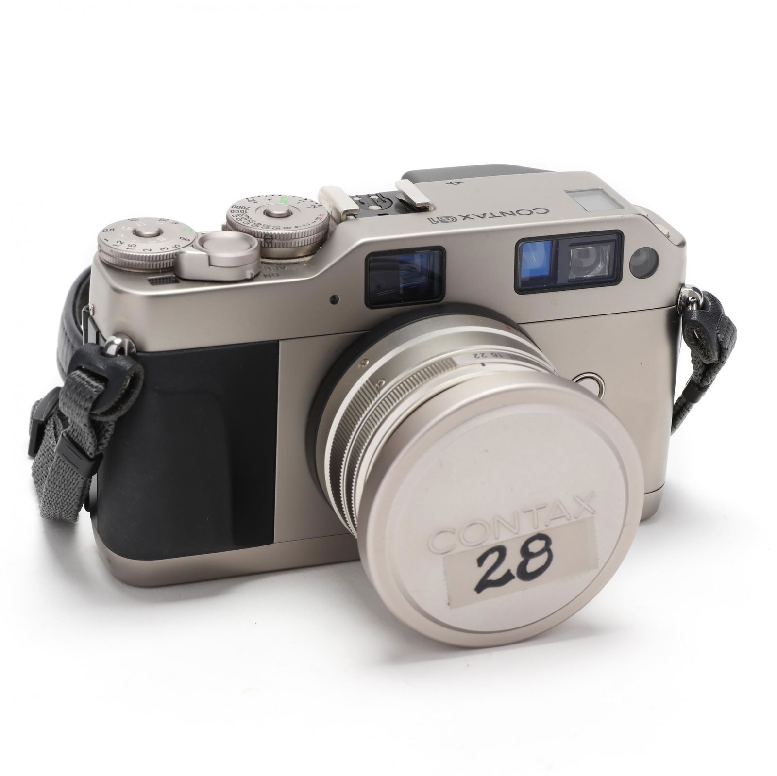 Contax Green Label G1 Camera with Carl Zeiss Biogon T*: Contax Green Label G1 Camera with Carl Zeiss Biogon T* Lens the camera housed in blue leather Contax case with strap; the lens is 28mm, f/2.8 and has a Contax hood and cap. Case 4 x 6 x 4.25 in. From