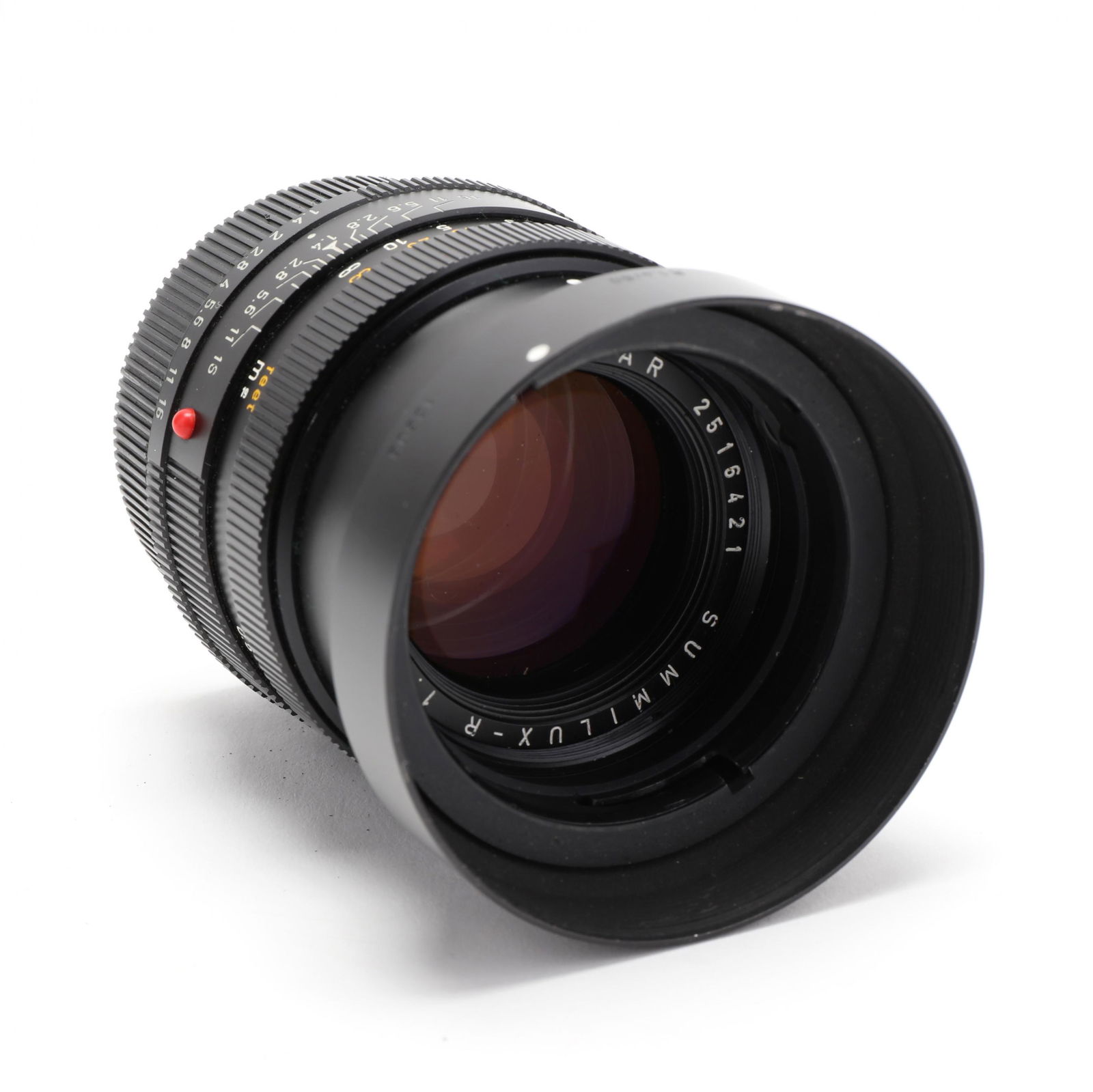 Leitz Wetzlar Summilux-R 50mm f1.4 Lens: Leitz Wetzlar Summilux-R 50mm f1.4 Lensmade in Germany, serial number 2516421; with Nikon leather bag and extra lens cap. From a Midwestern Collection Additional high-resolution photos are available a