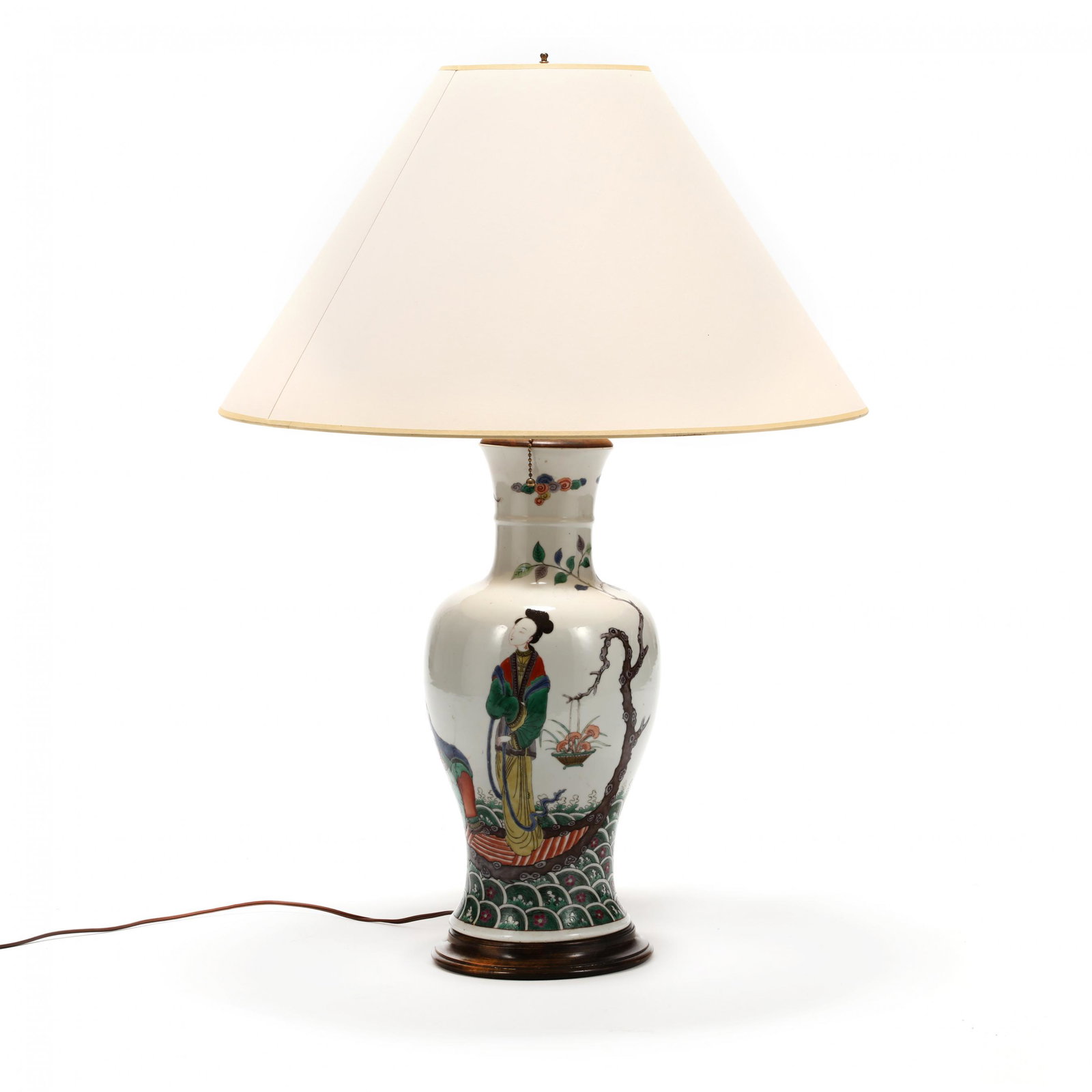 A Chinese Famille Verte Porcelain Figural Vase Lamp: A Chinese Famille Verte Porcelain Figural Vase Lamp19th century, porcelain hand painted with the Daoist Immortal Liu Hai seated on a rock looking down at a toad, and in a boat made of a wooden tree tr