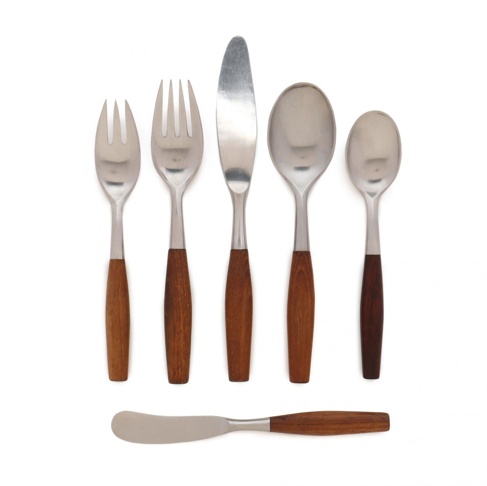 Jens Quistgaard, (74) Pieces of Fjord Flatware: Jens Quistgaard, (74) Pieces of Fjord Flatware Dansk, designed 1954, teak and stainless steel, including (6) serving pieces, (11) soup spoons, (10) dinner forks, (14) salad forks, (10) dinner knives,