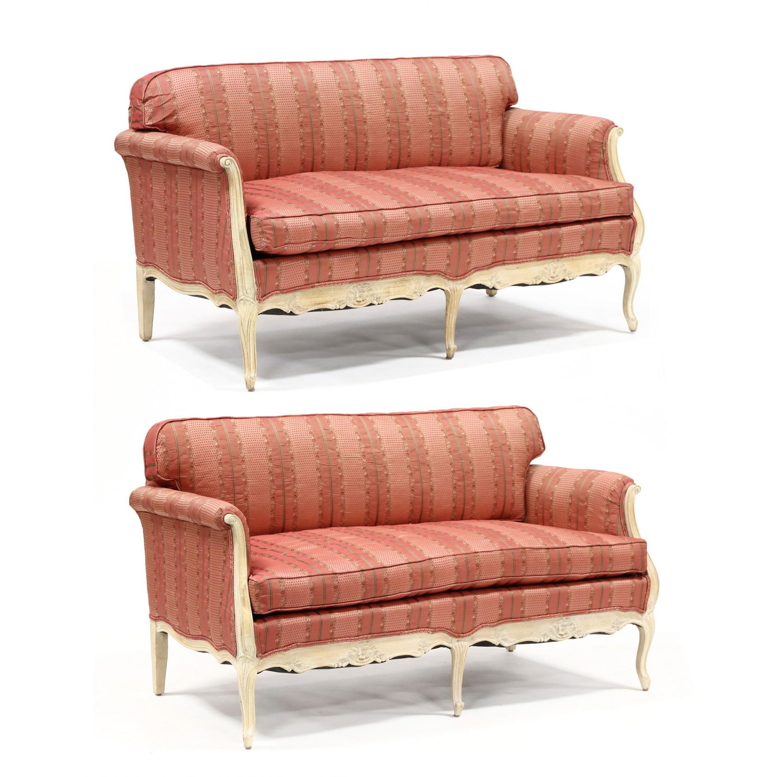 Pair of French Provincial Style Upholstered Fruitwood: Pair of French Provincial Style Upholstered Fruitwood Setteeslate 20th century, floral over upholstery with loose cushions, picked relief carved wood frame, raised on three front cabriole legs. 32 x 6