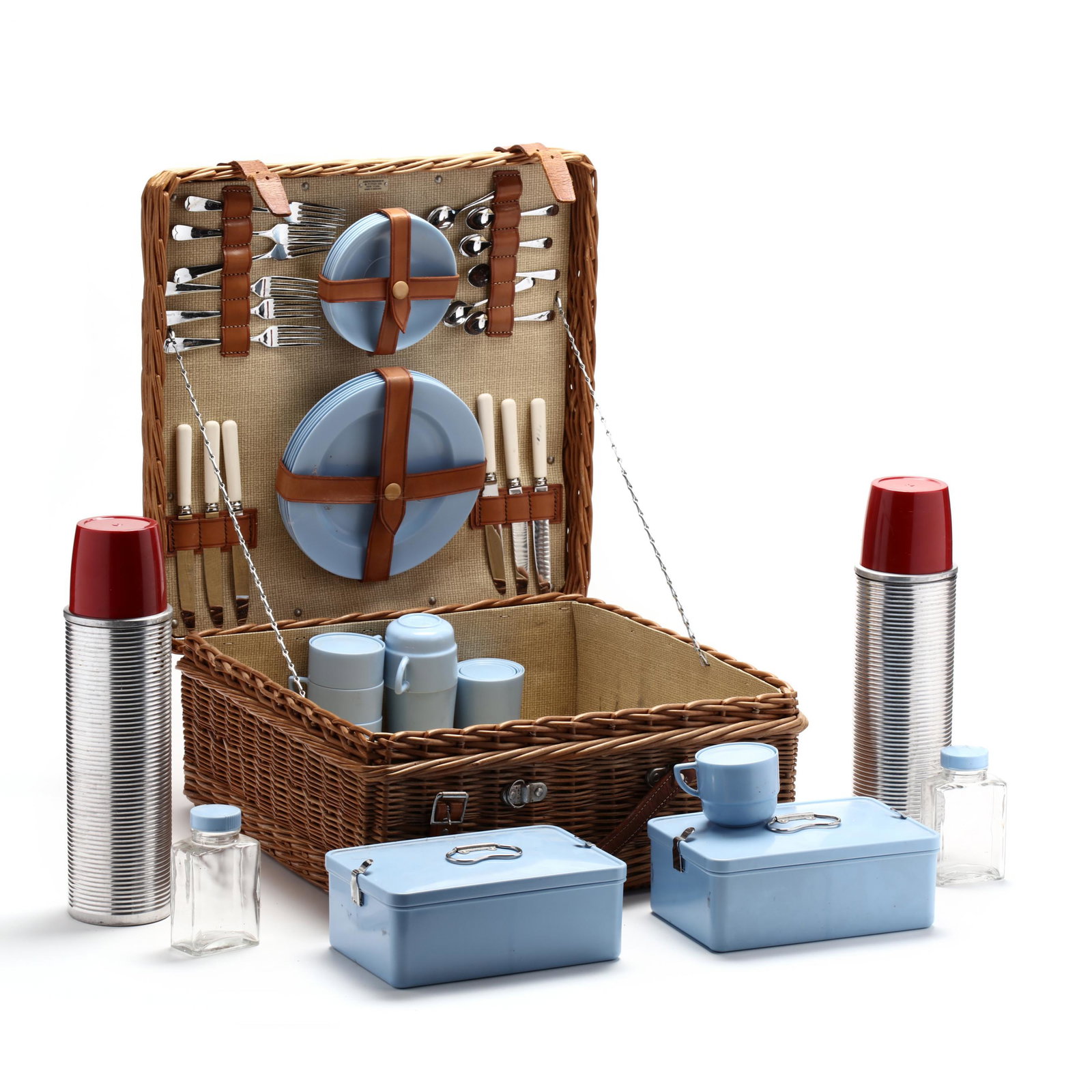 Abercrombie & Fitch, Vintage Picnic Set in Basket: Abercrombie & Fitch, Vintage Picnic Set in Basket mid 20th century, wicker basket with leather straps, hinged lid with Bandalasta service for six including lunch plates, teacups and saucers, a pair of